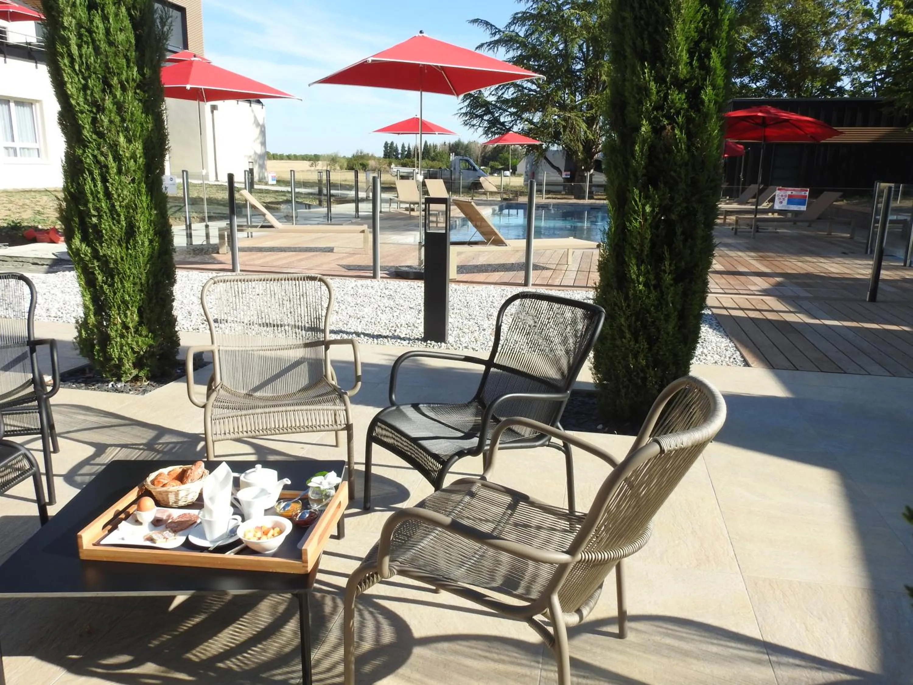 Swimming pool in Logis Hotel Relais Saint Jacques - Châteauroux