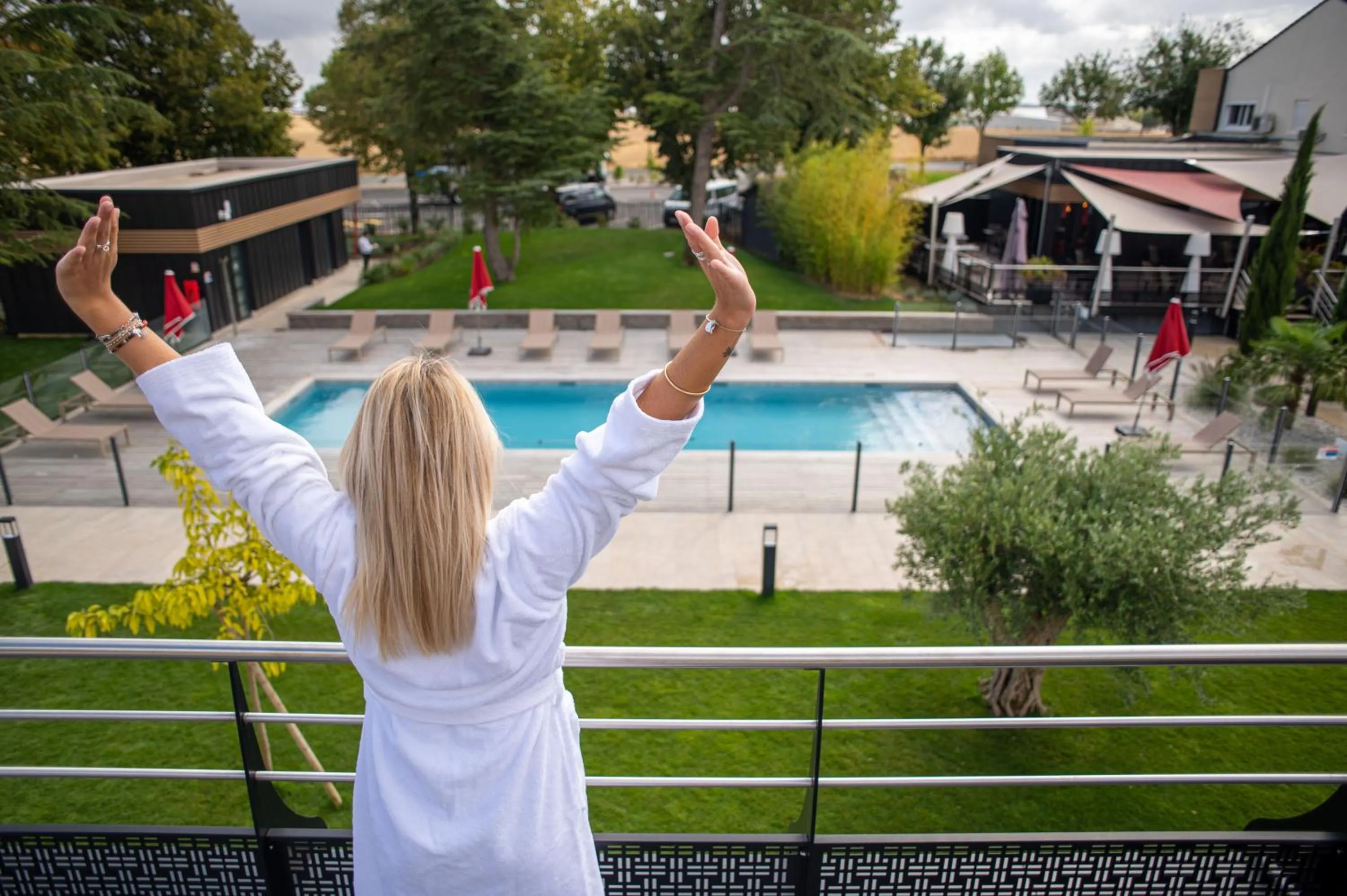 Pool view in Logis Hotel Relais Saint Jacques - Châteauroux