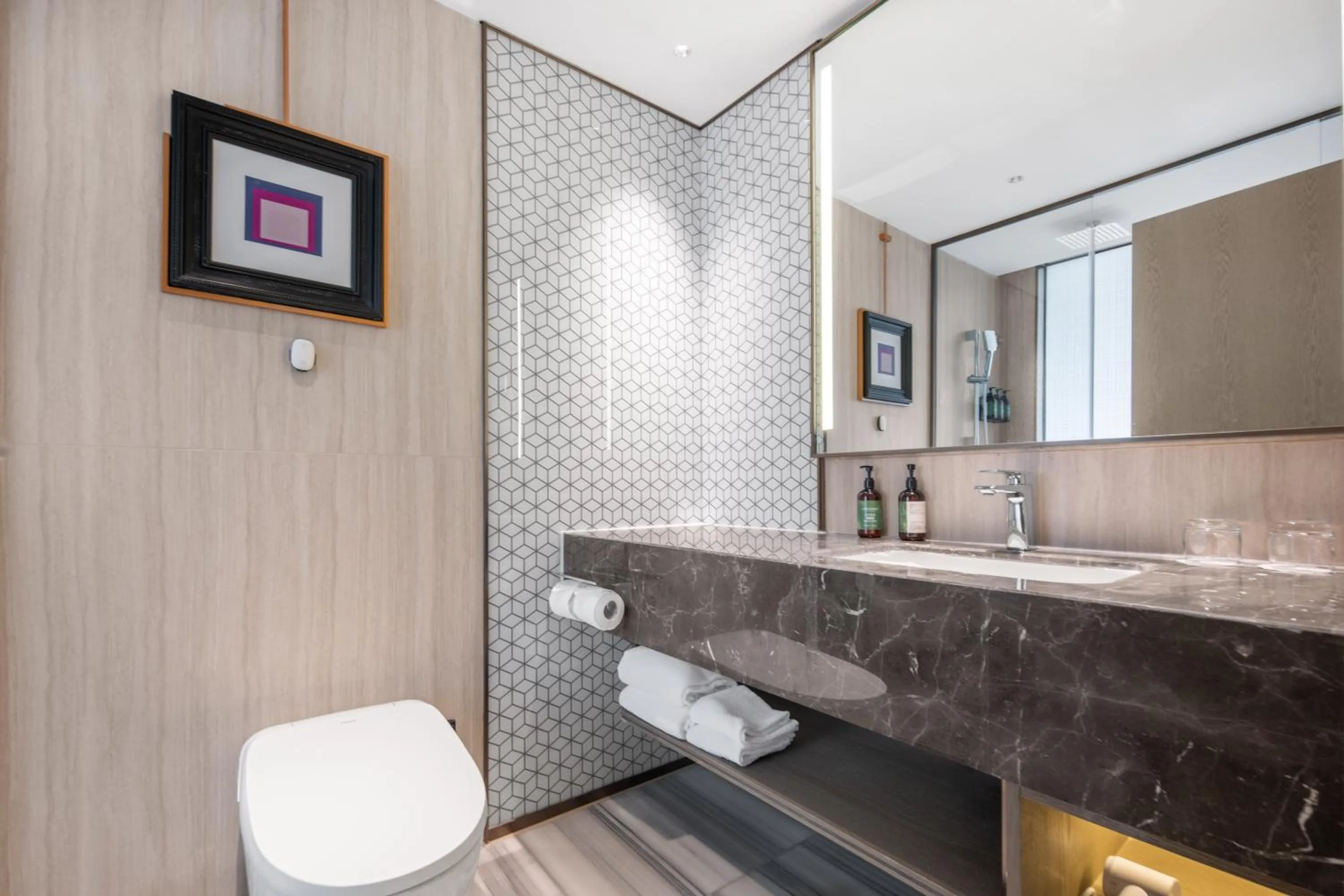 Toilet in Crowne Plaza City Center Ningbo by IHG