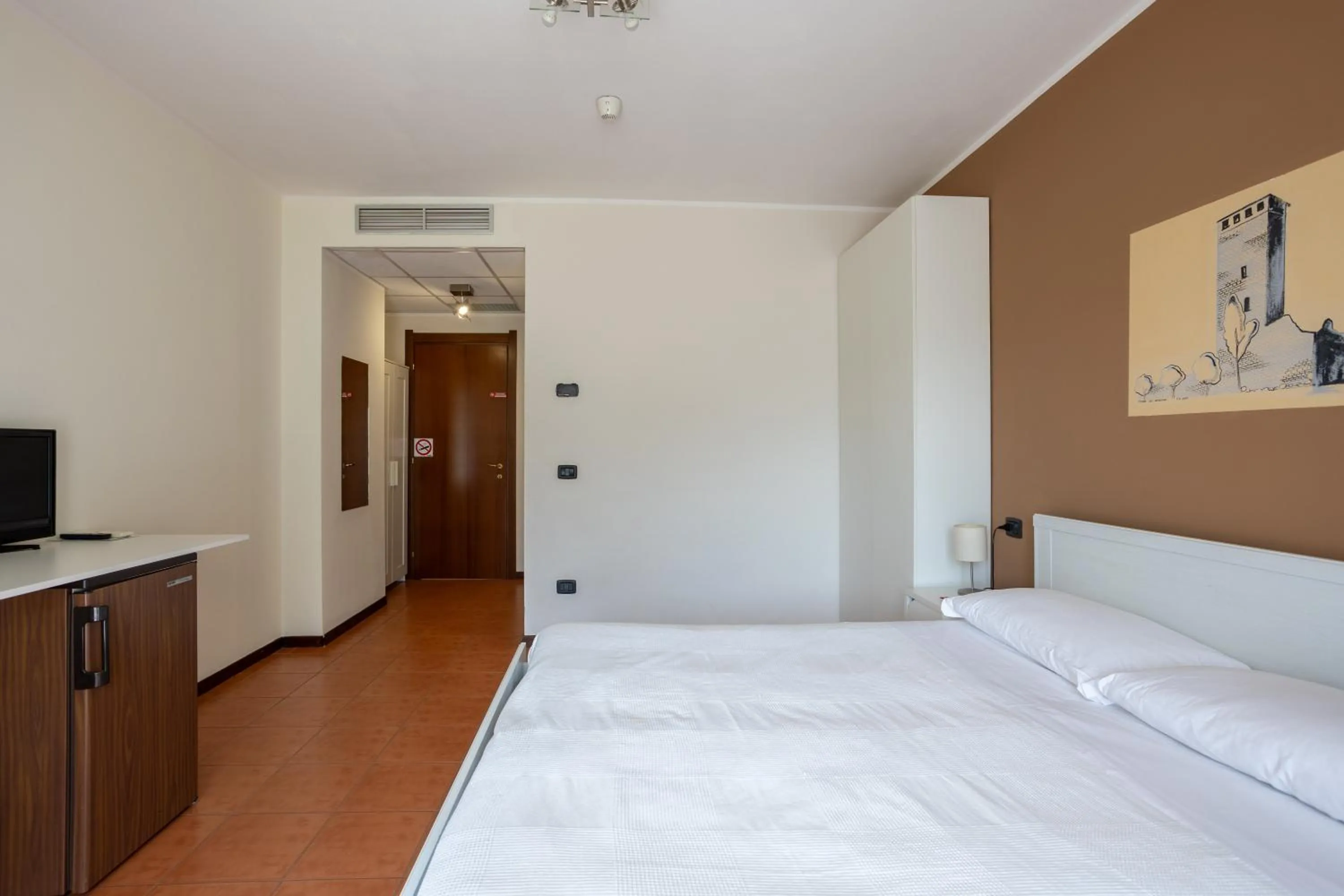 Bed in Hotel Fontaine Bleue