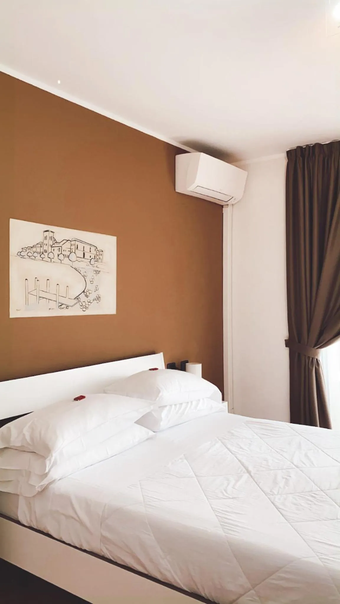 Bed in Hotel Fontaine Bleue