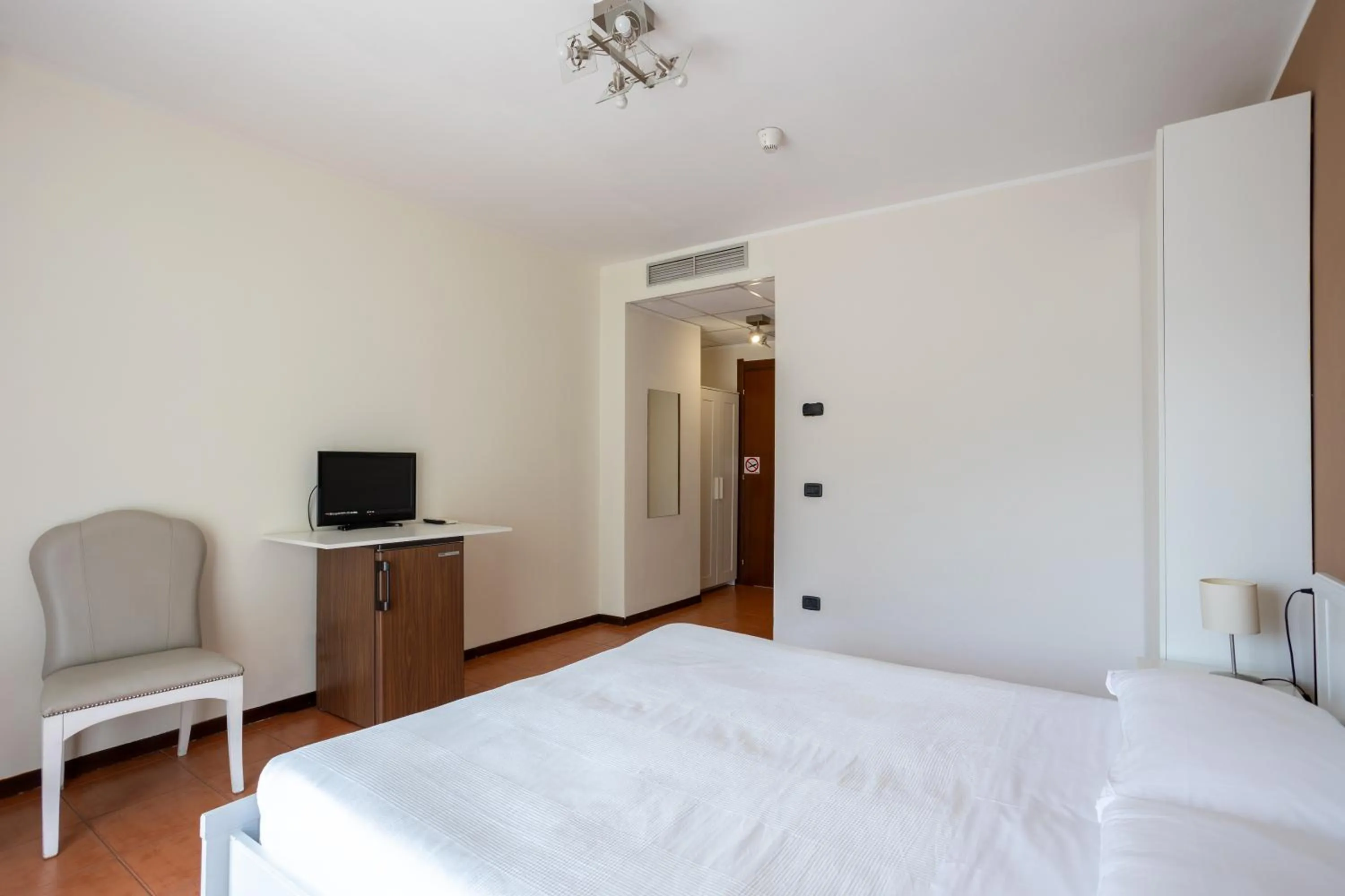 Bed in Hotel Fontaine Bleue