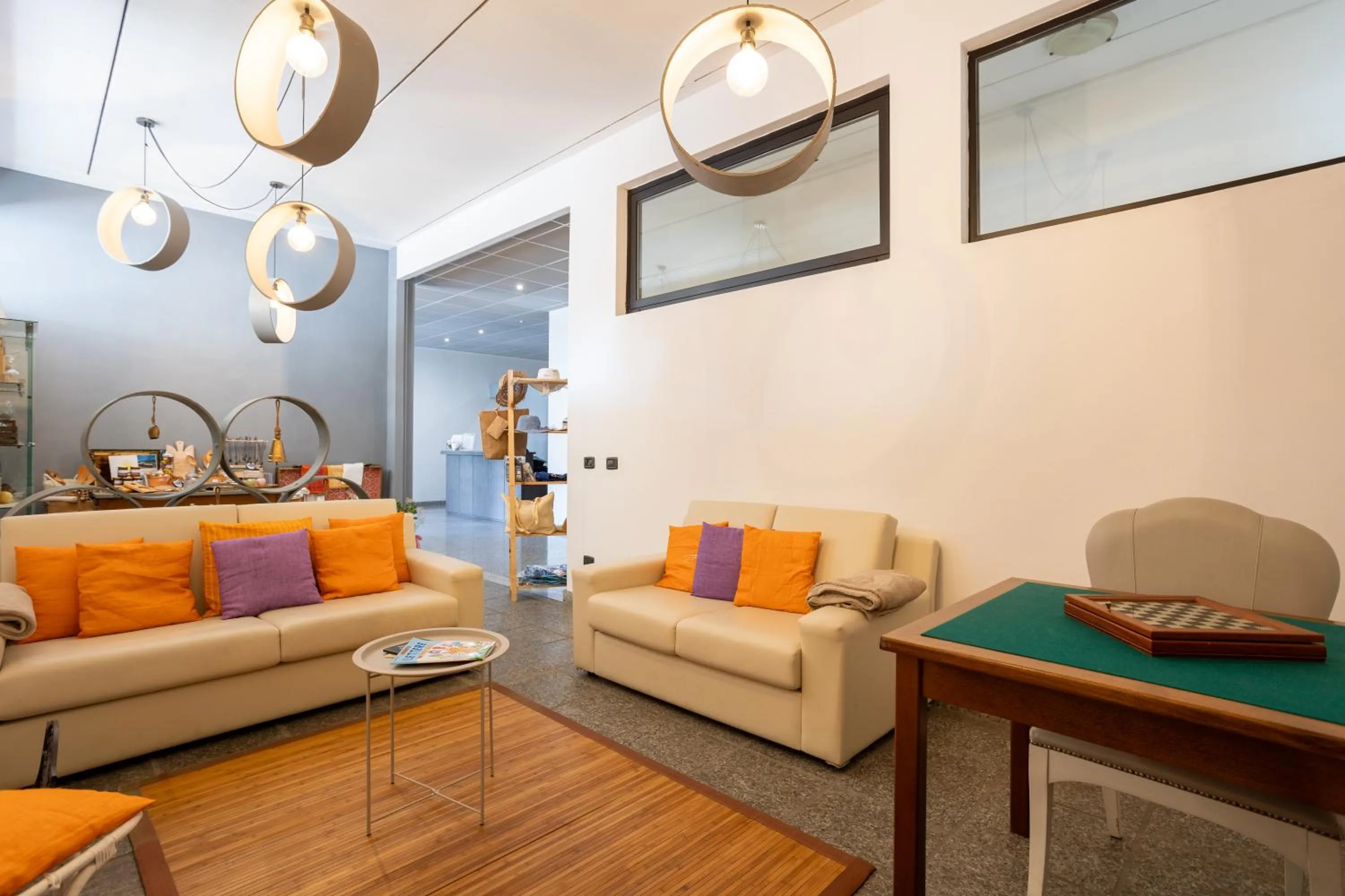 Communal lounge/ TV room in Hotel Fontaine Bleue