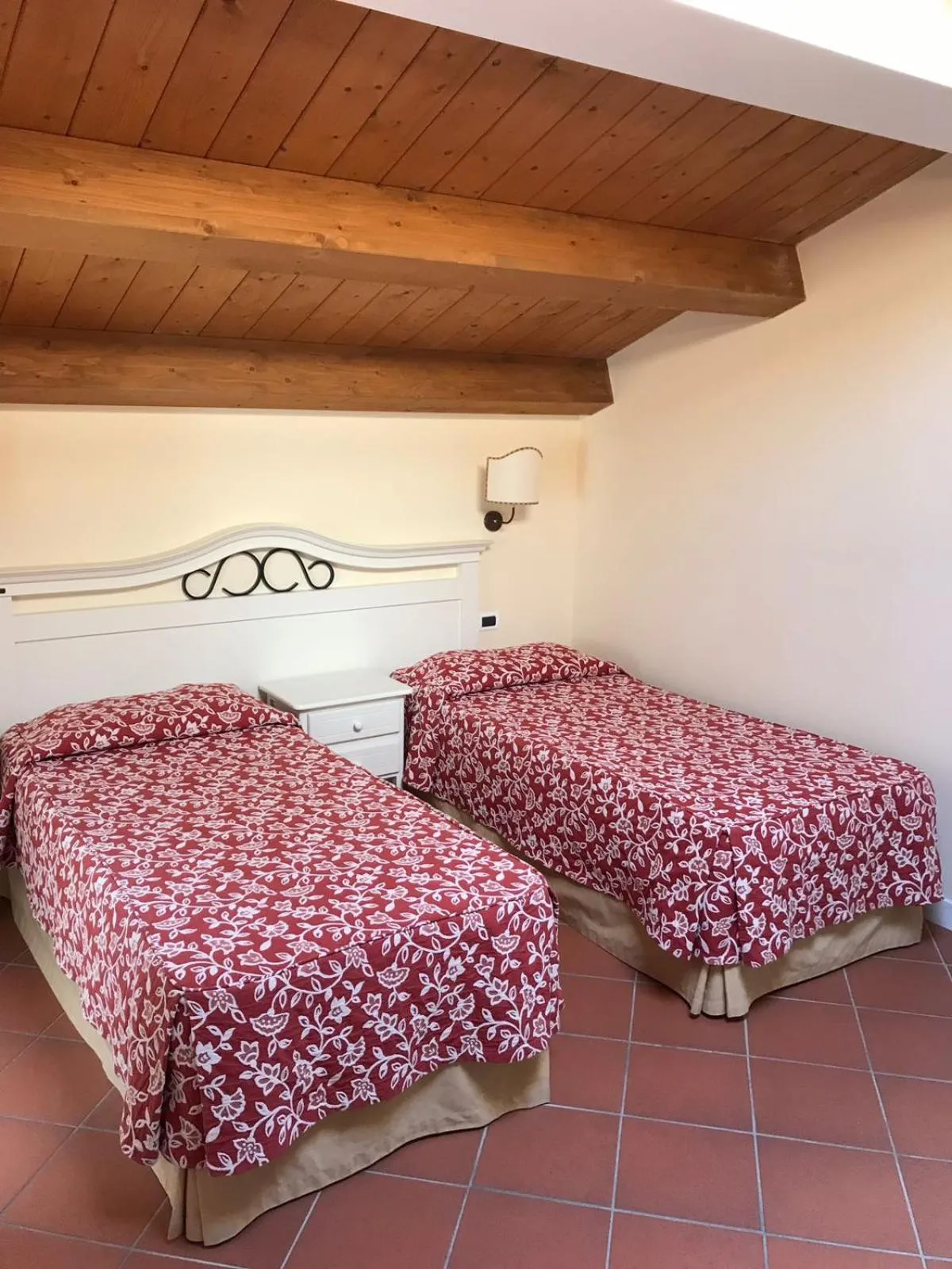 Bed in Villa Rosella Resort