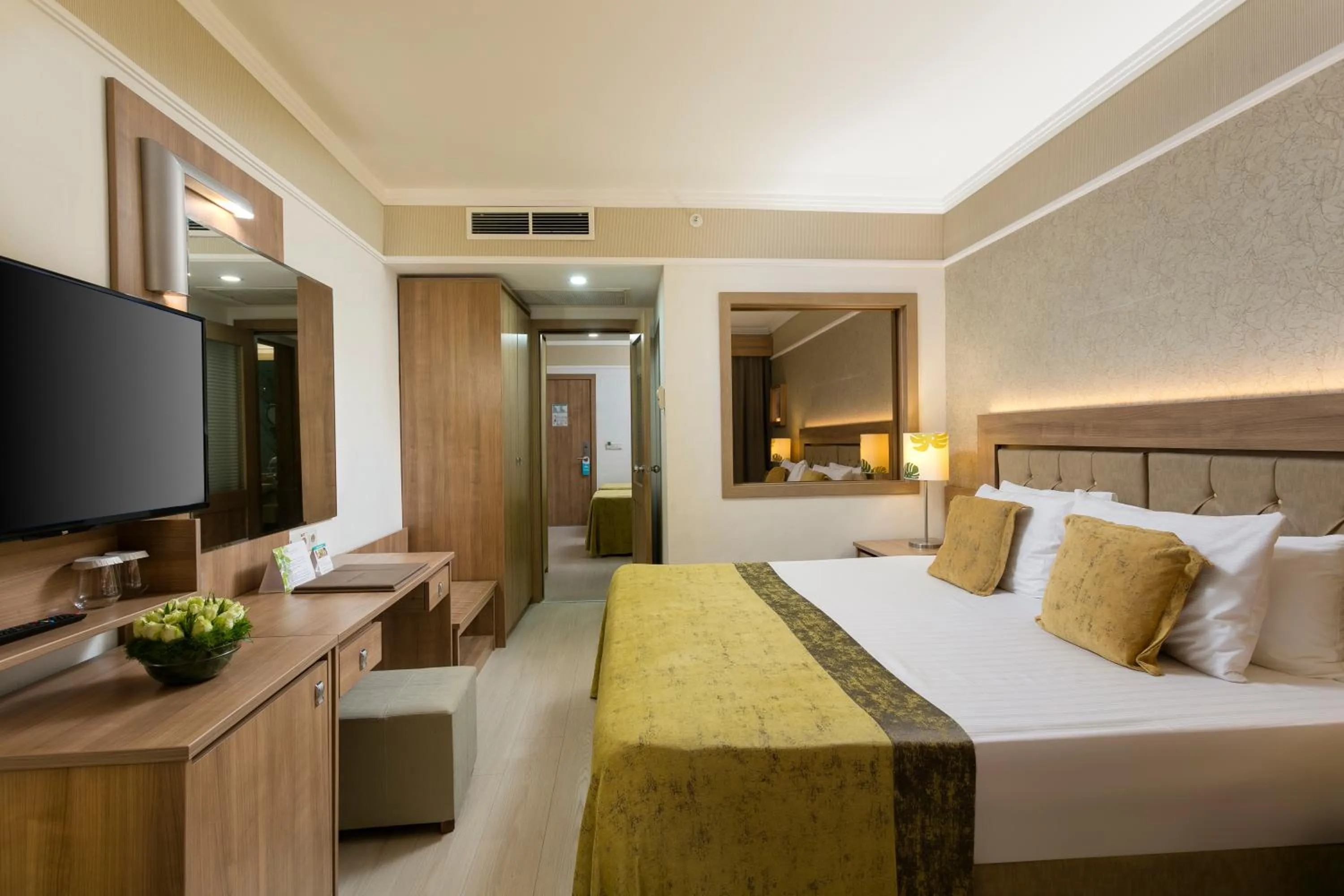 Communal lounge/ TV room, Bed in Innvista Hotels Belek