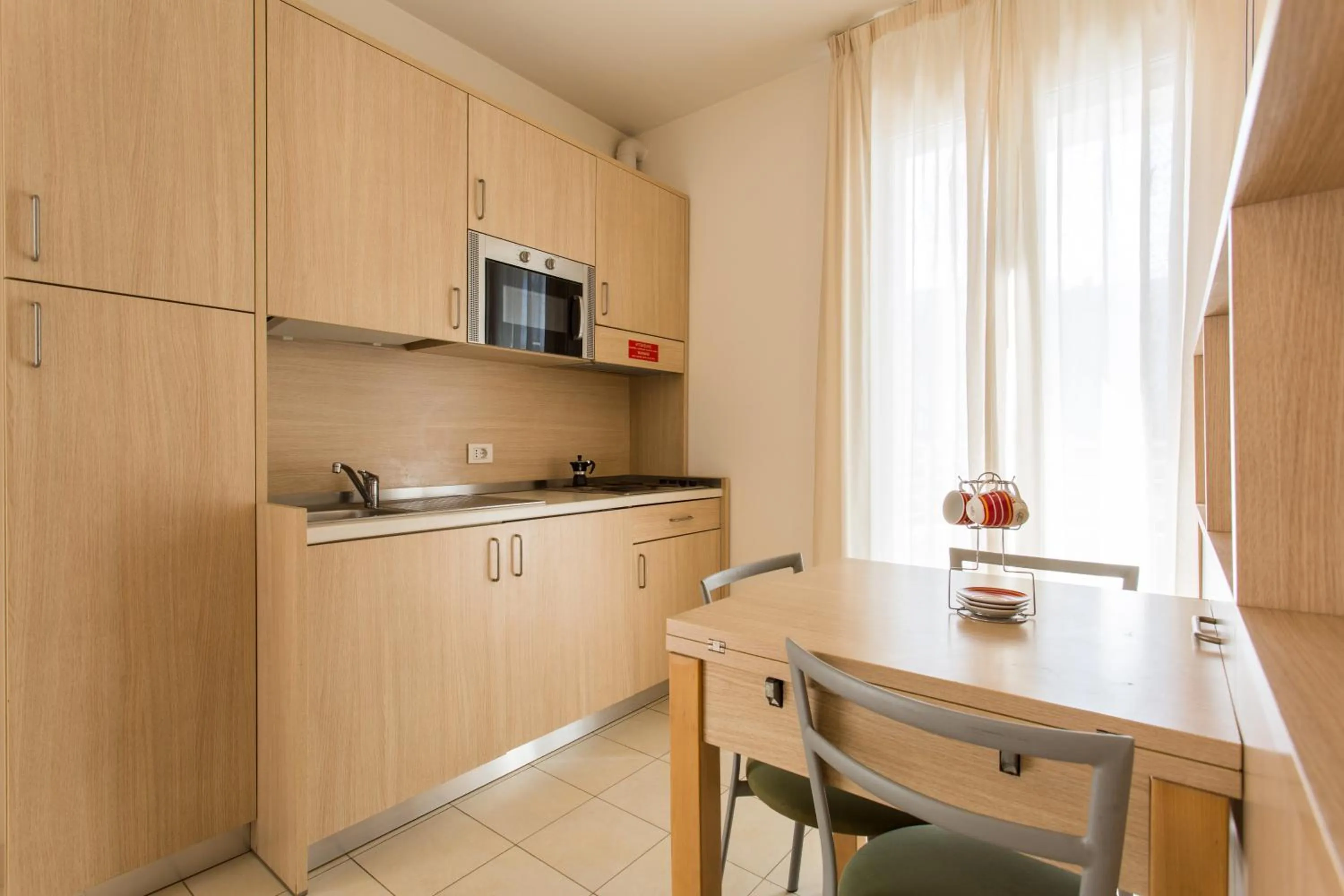Kitchen or kitchenette in Wally Residence
