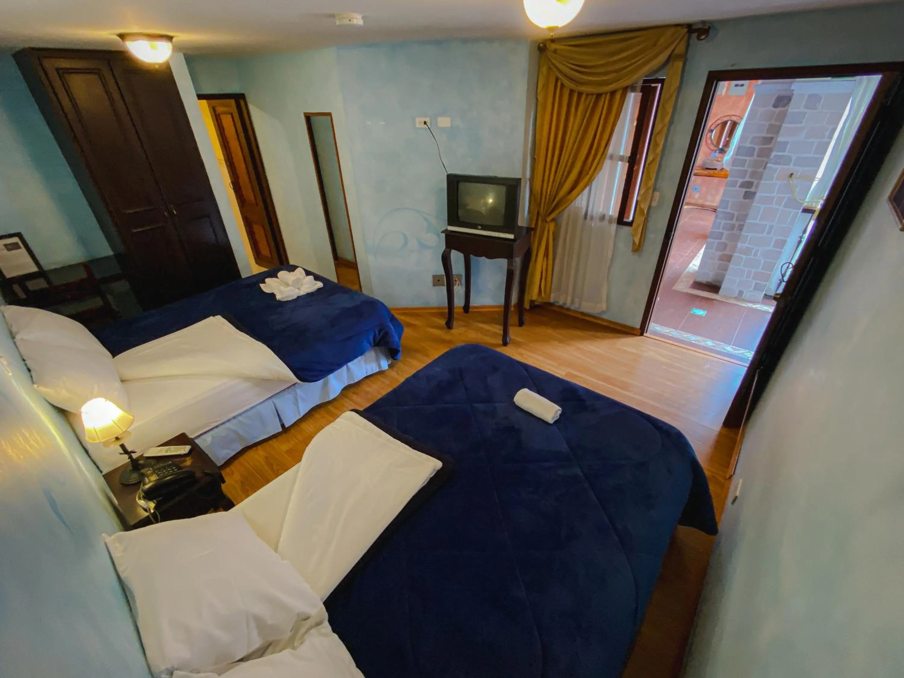 Photo of the whole room, Bed in Villa de Tacvnga Hotel