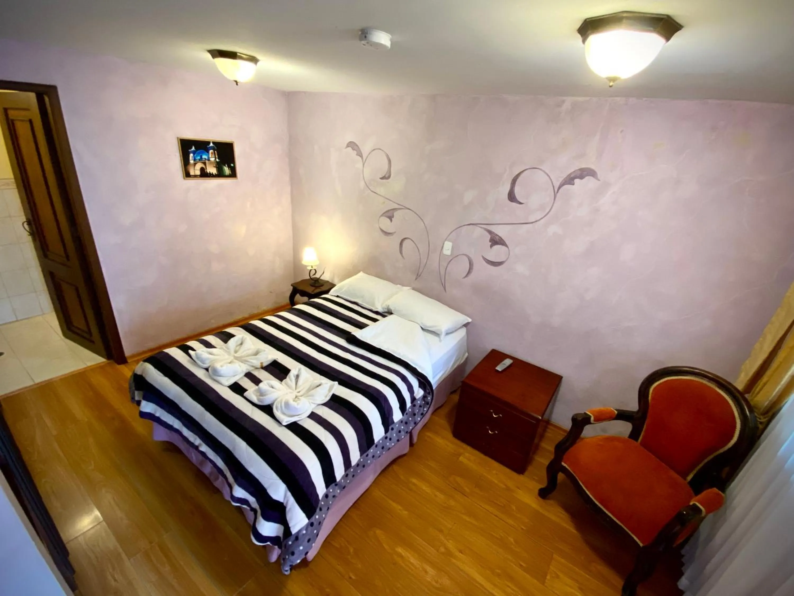 Photo of the whole room, Bed in Villa de Tacvnga Hotel