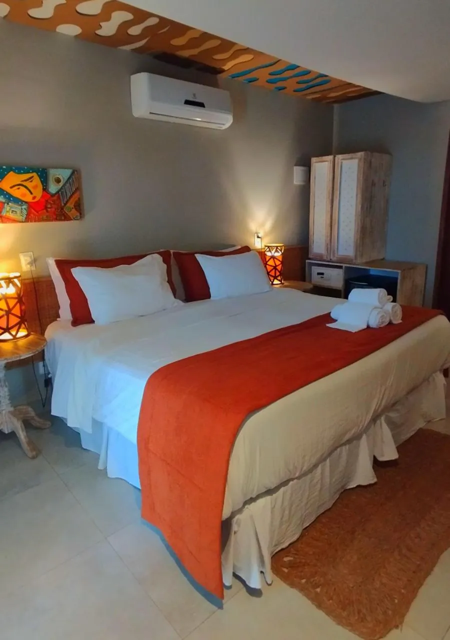 Bed in Pousada Recanto