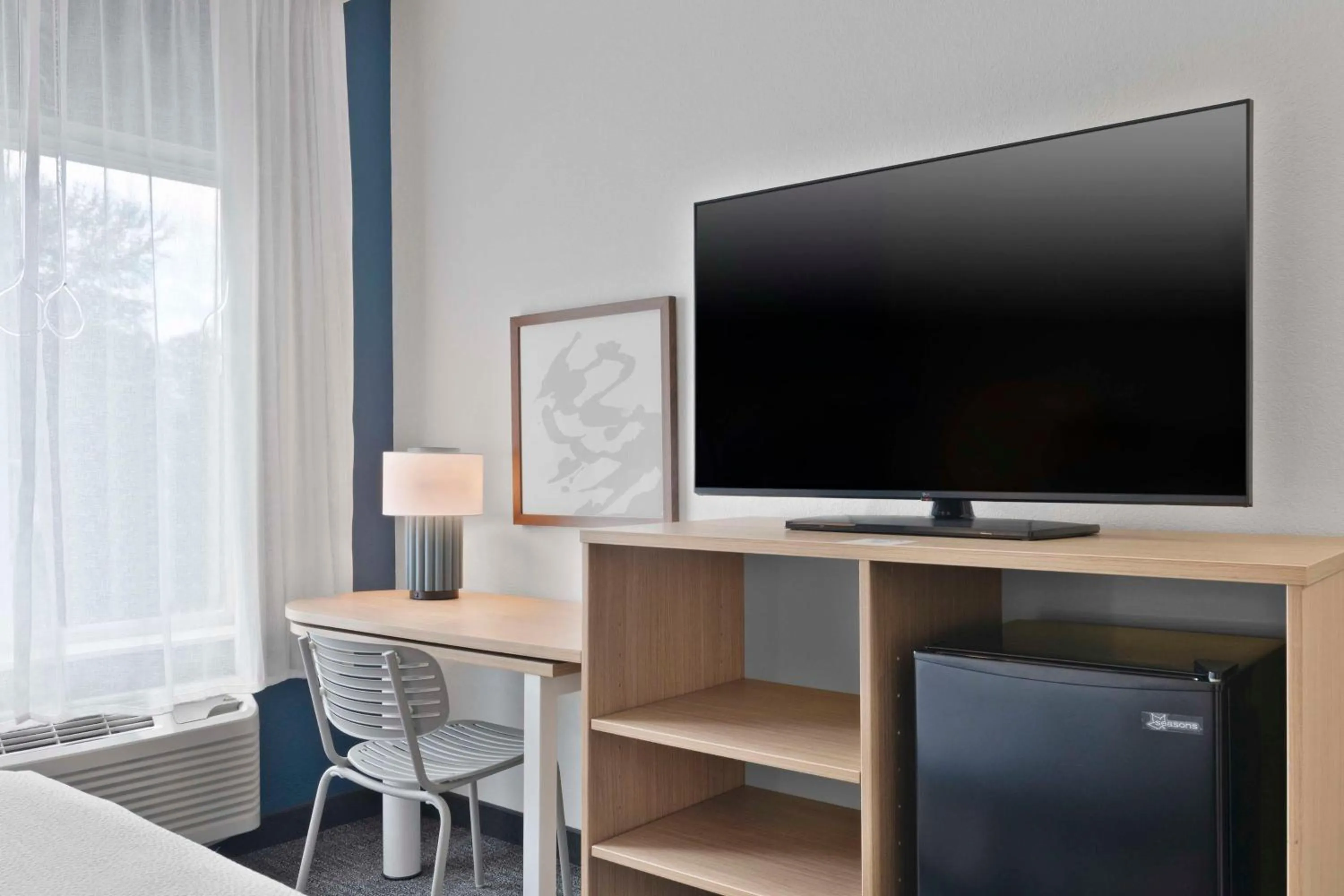 Bedroom in Spark by Hilton Orlando near SeaWorld