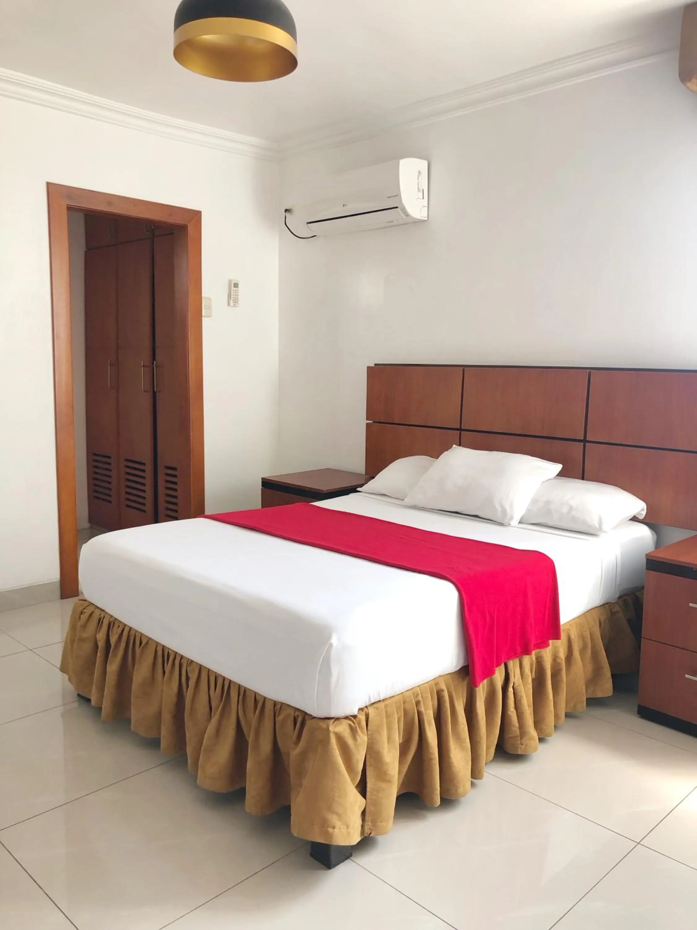 Bed in Hoteles en Guayaquil - Suites Guayaquil Cerca del Aeropuerto