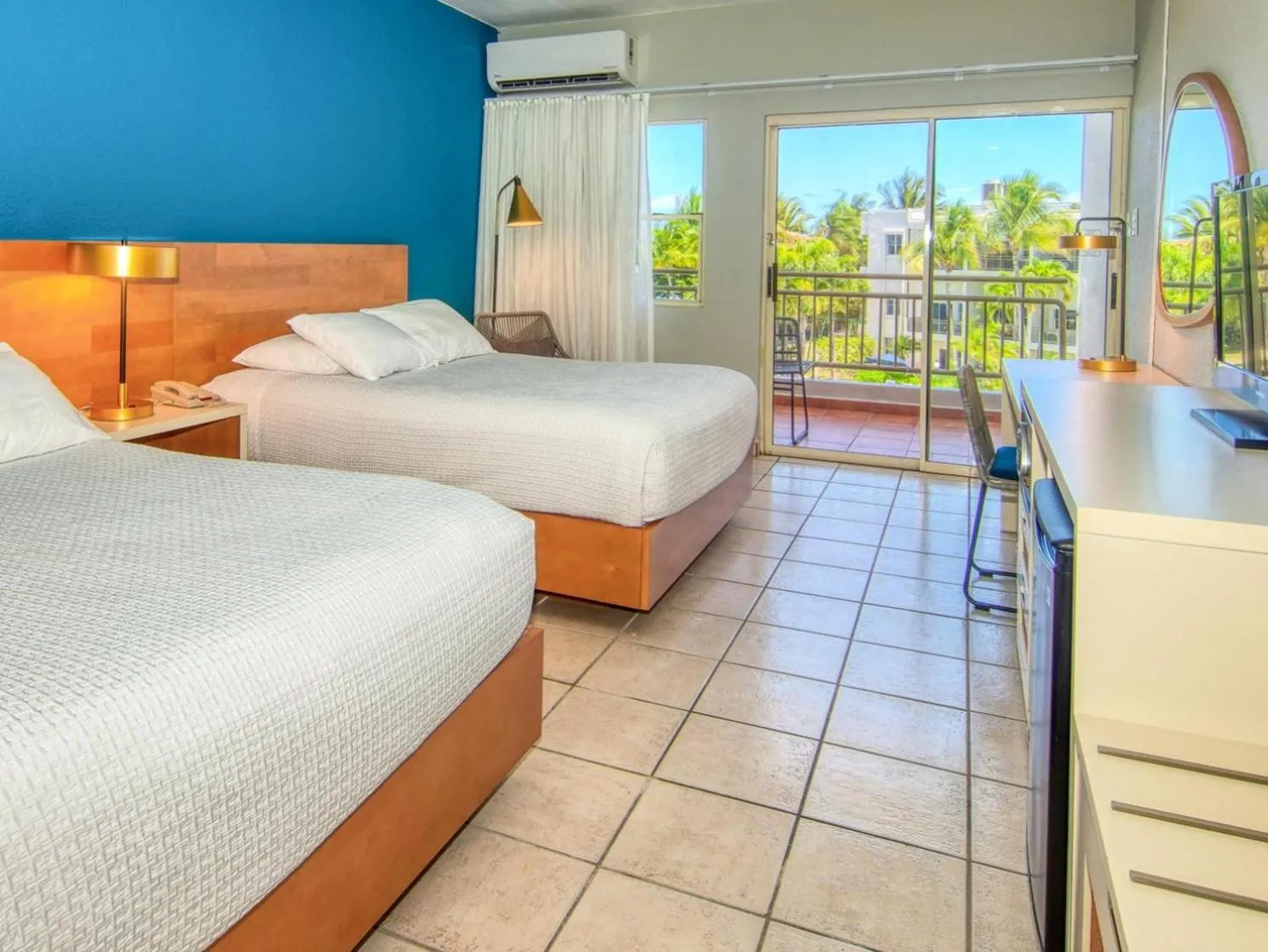 Bed in Rincon of the Seas Grand Caribbean Hotel