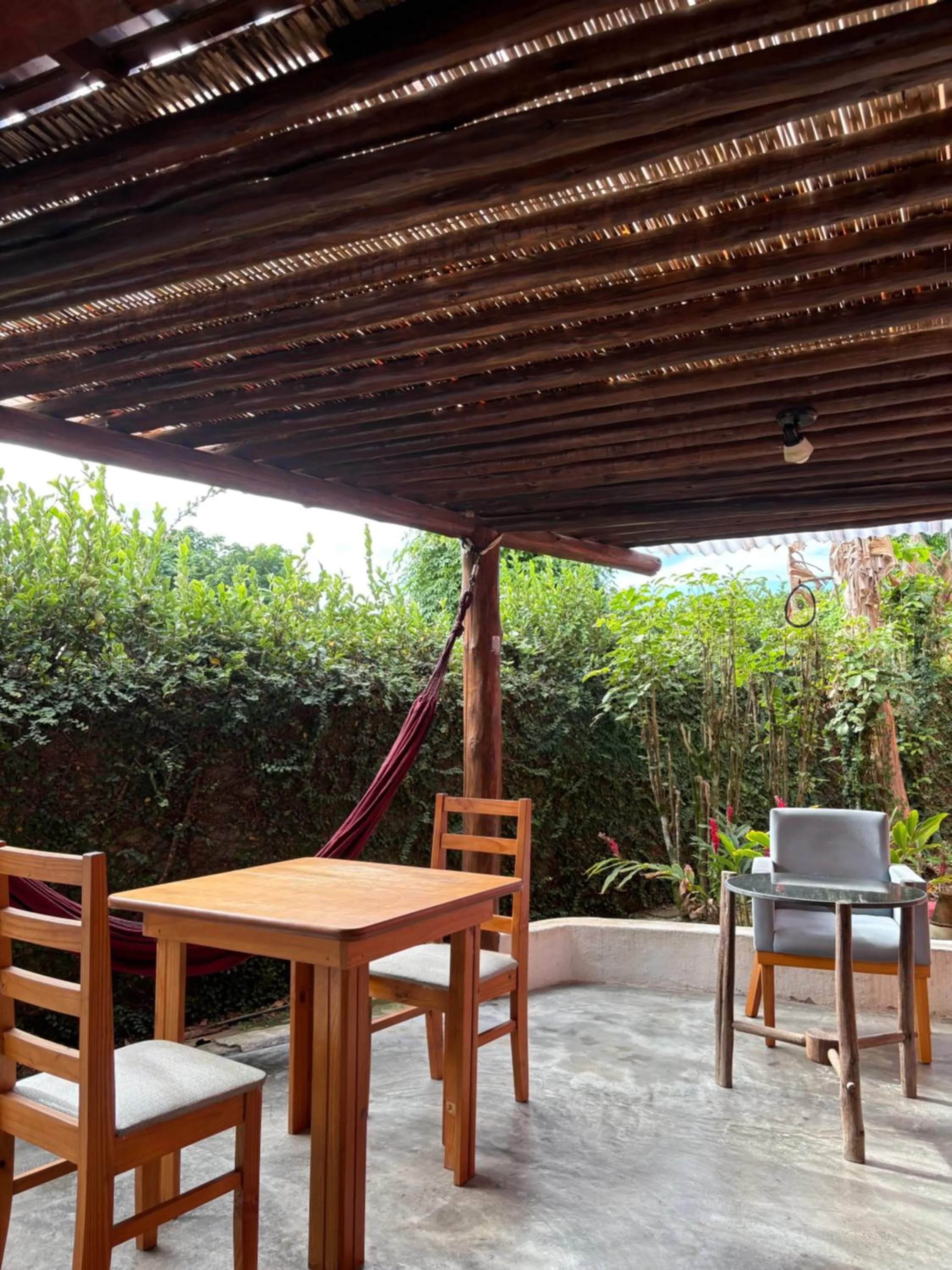 Seating area in Novos Baianos Hostel e Pousada
