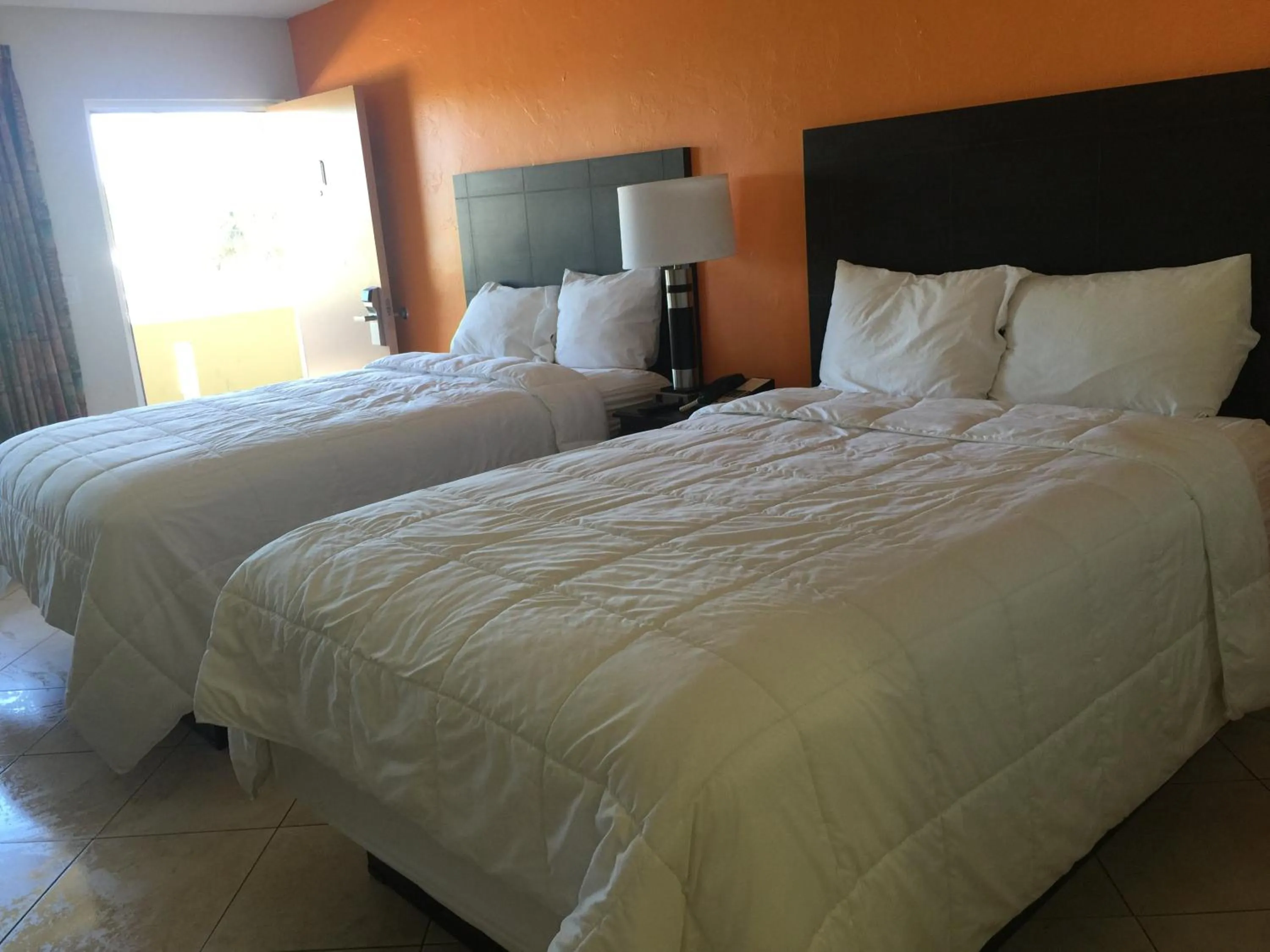 Decorative detail, Bed in Curtis Inn & Suites