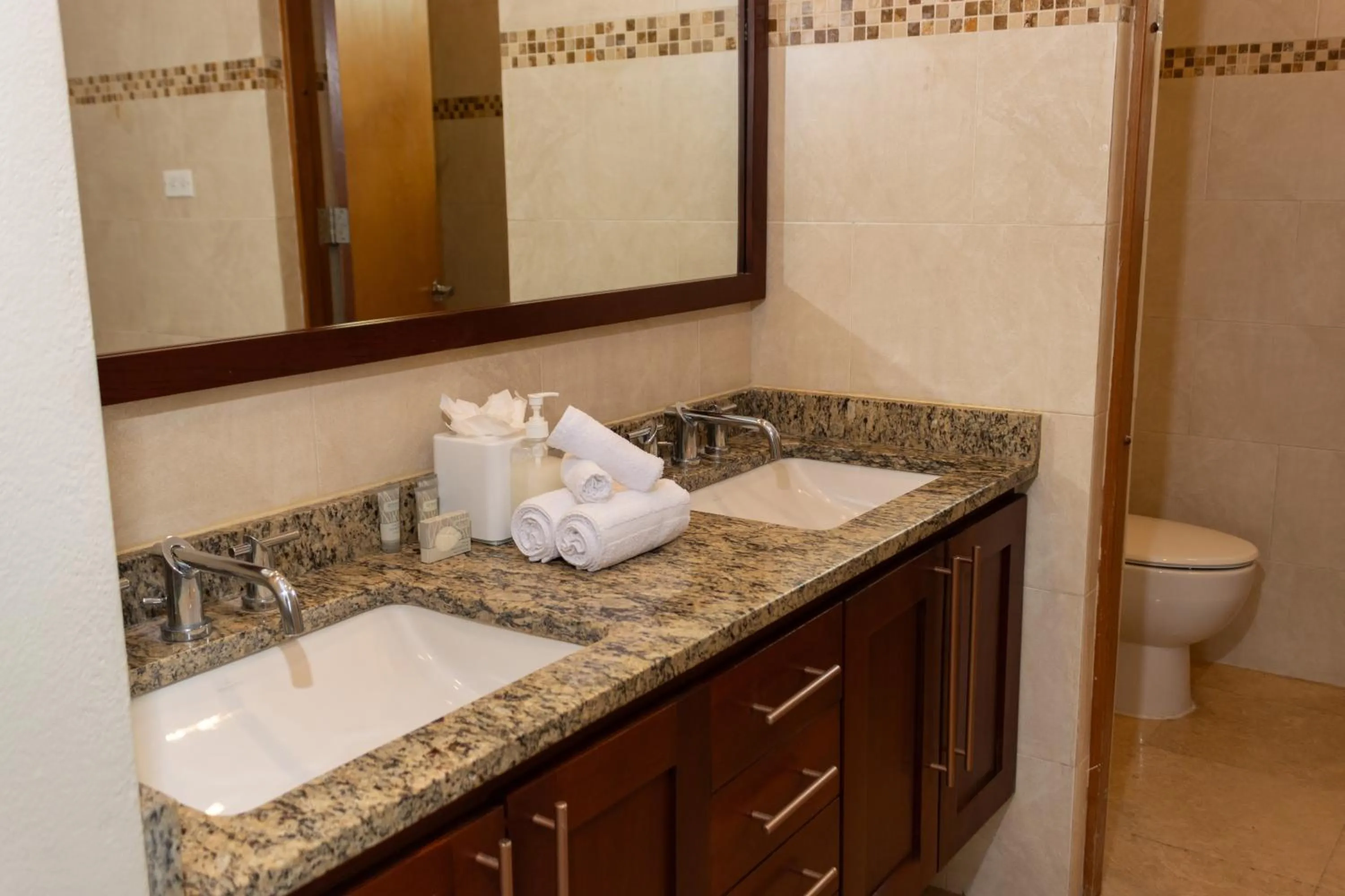 Toilet in Ciqala Suites Hotel - San Juan