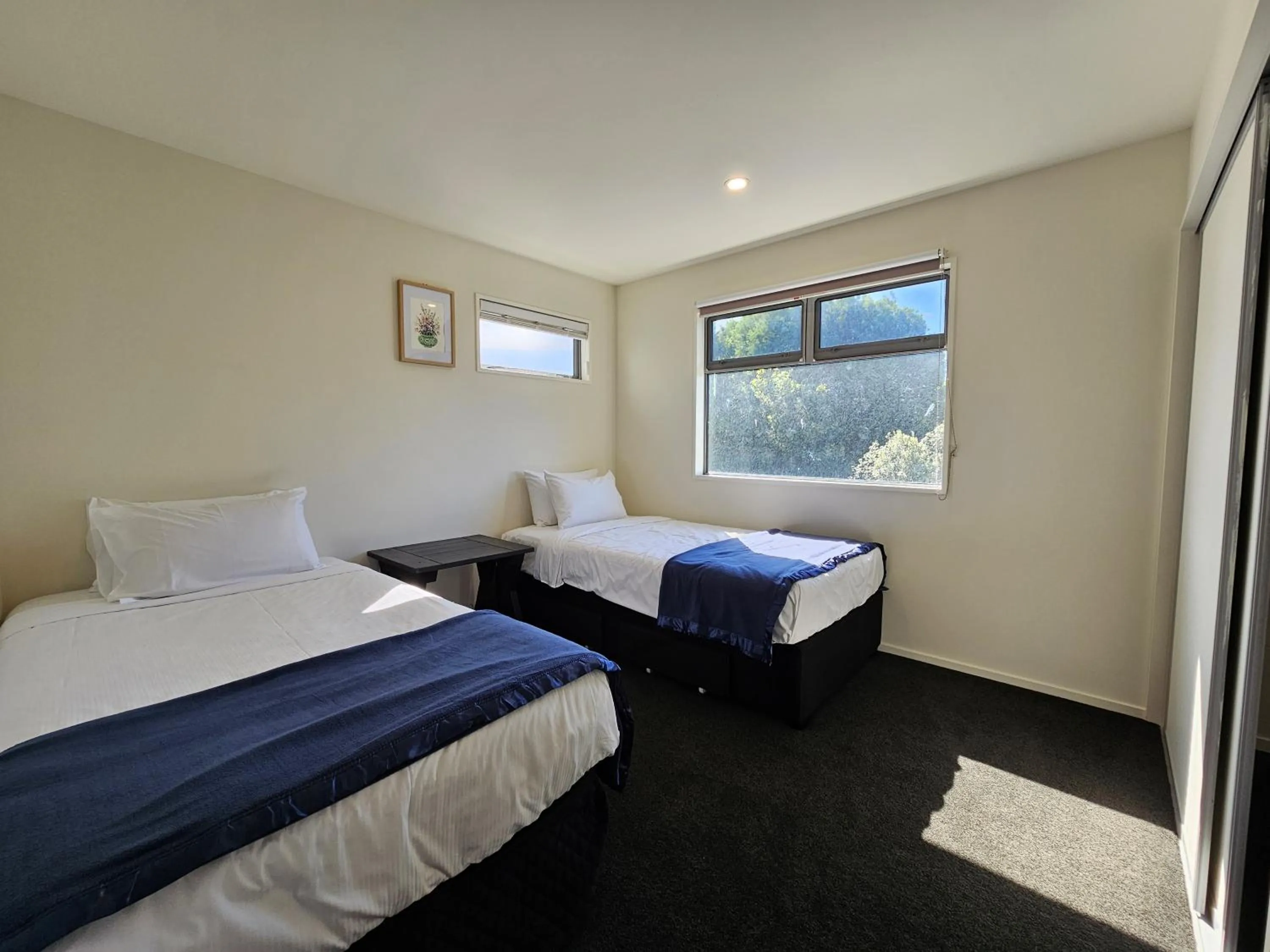 Bed in Azena Suites & Apartment