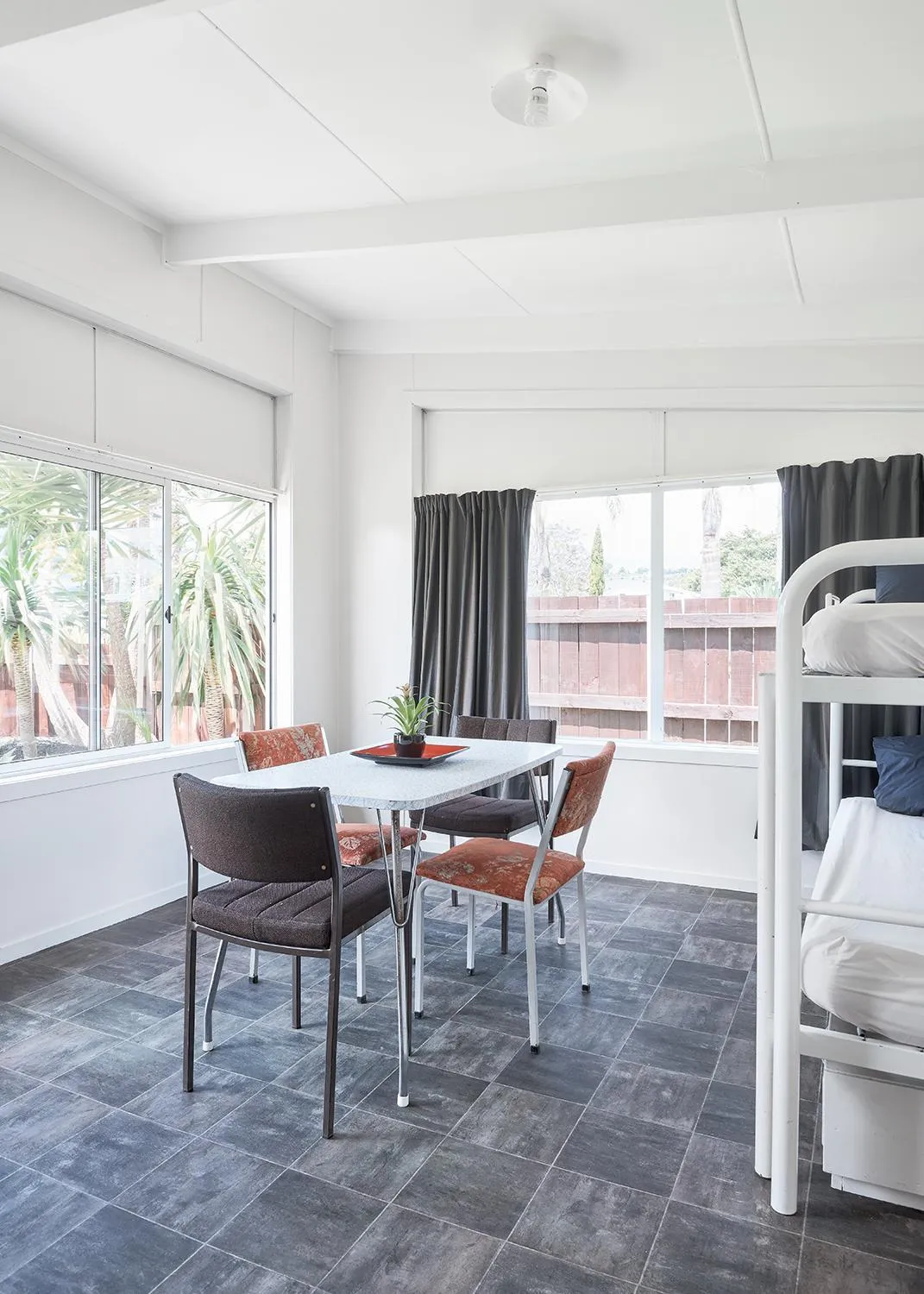 Dining area, Bed in Mercury Bay Holiday Park