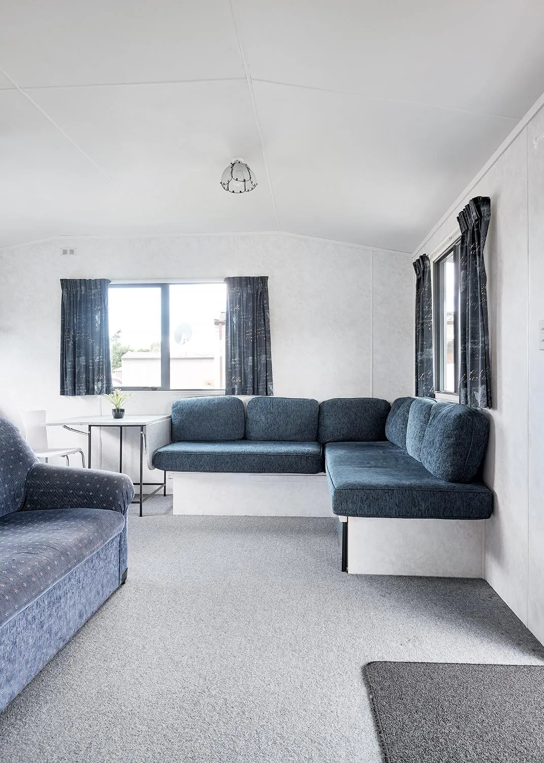 Living room in Mercury Bay Holiday Park