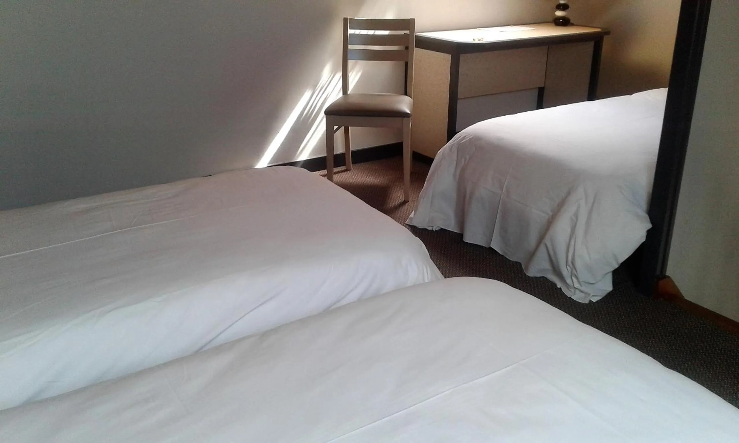 Bed in Hotel Restaurant Le Capricorne