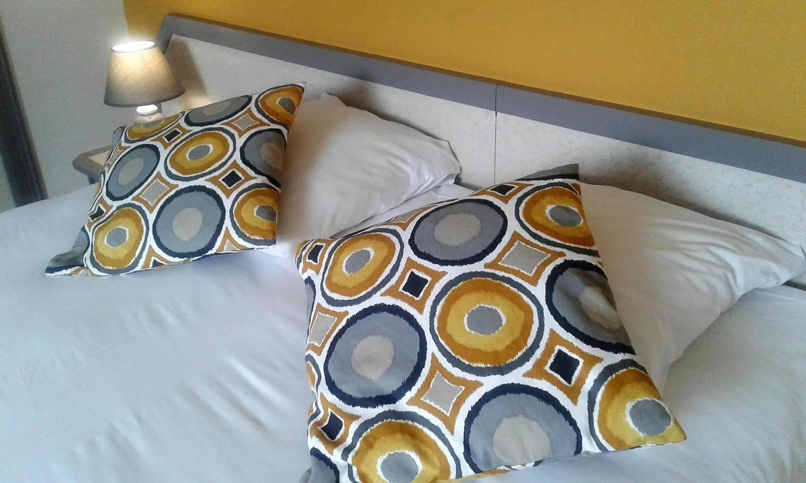 Bed in Hotel Restaurant Le Capricorne