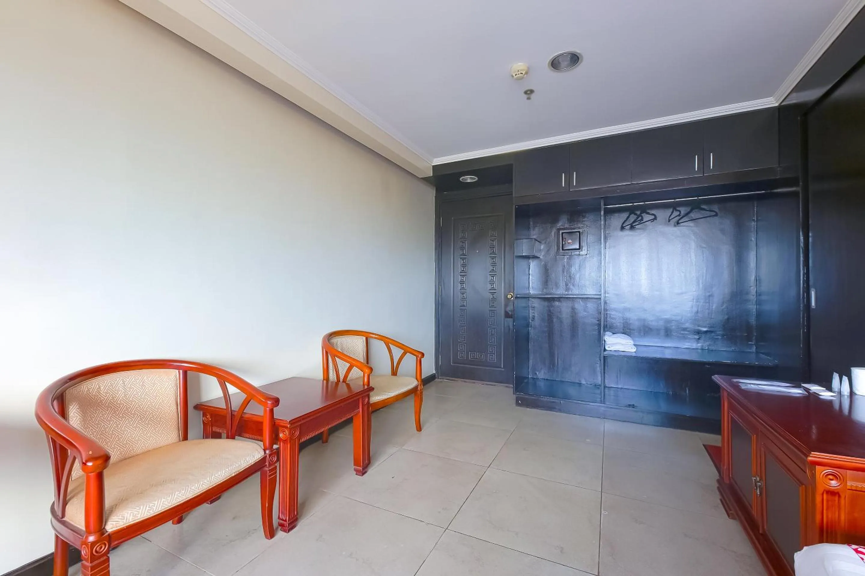 Bedroom in Super OYO 791 Bell Mansion