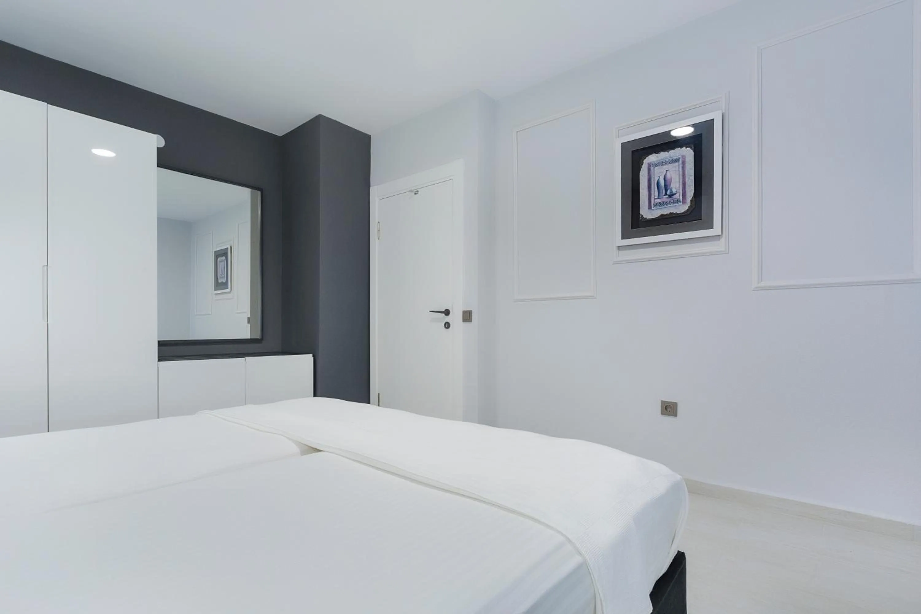 Bed in Twin Apart Hotel