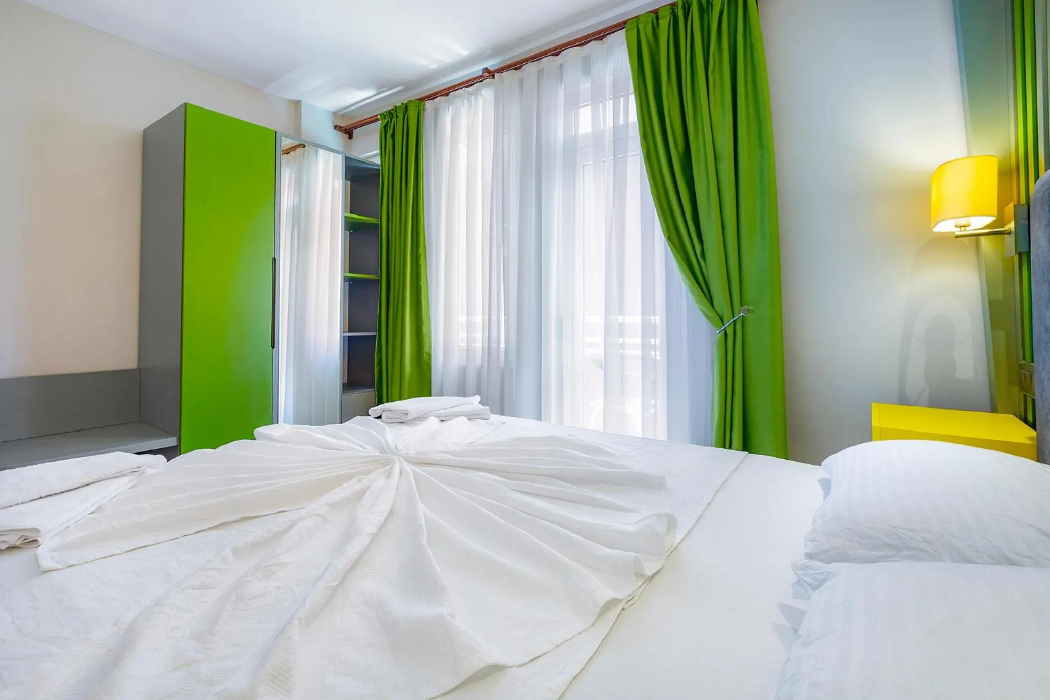 Bed in Twin Apart Hotel