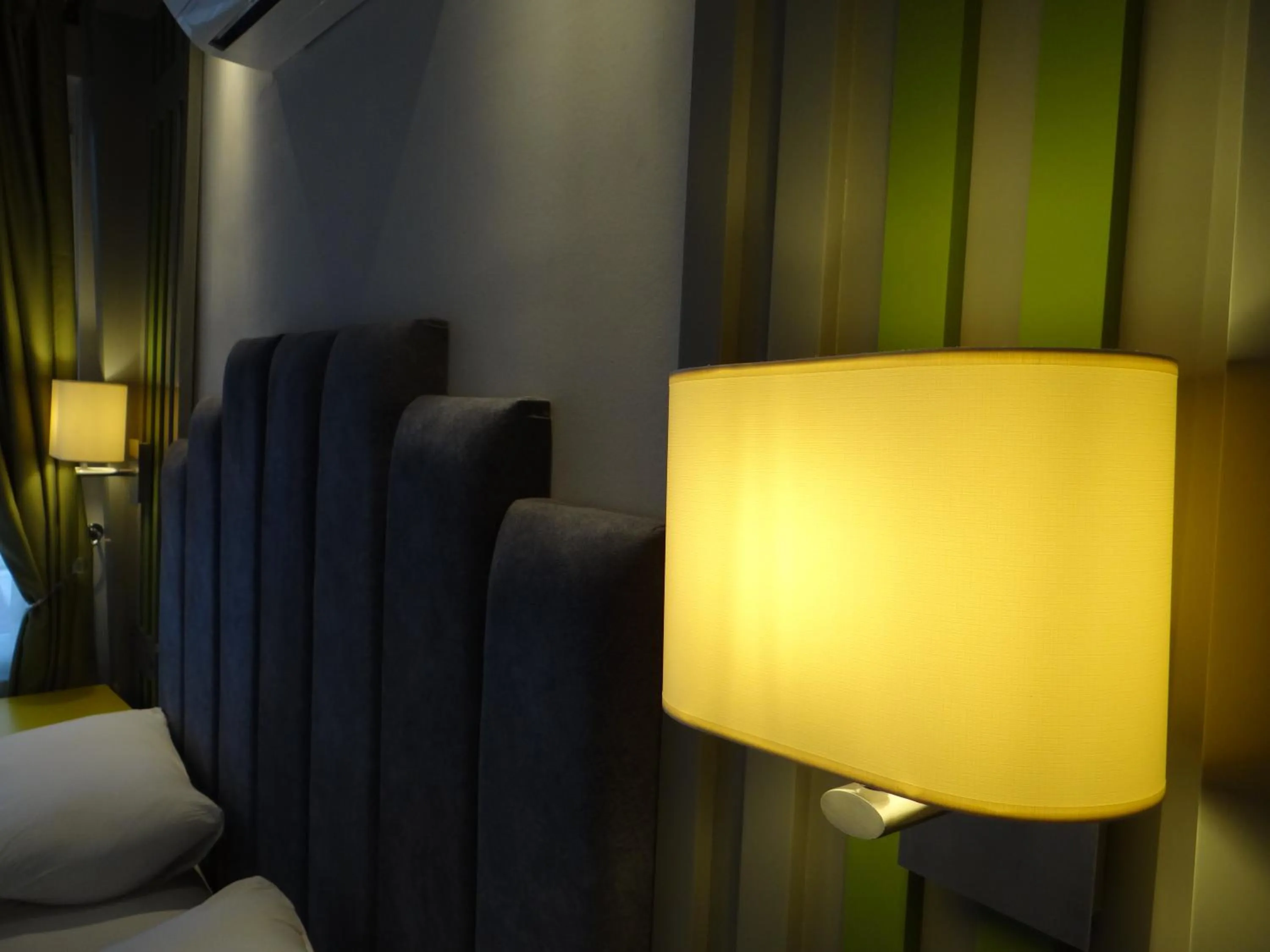 Bed in Twin Apart Hotel