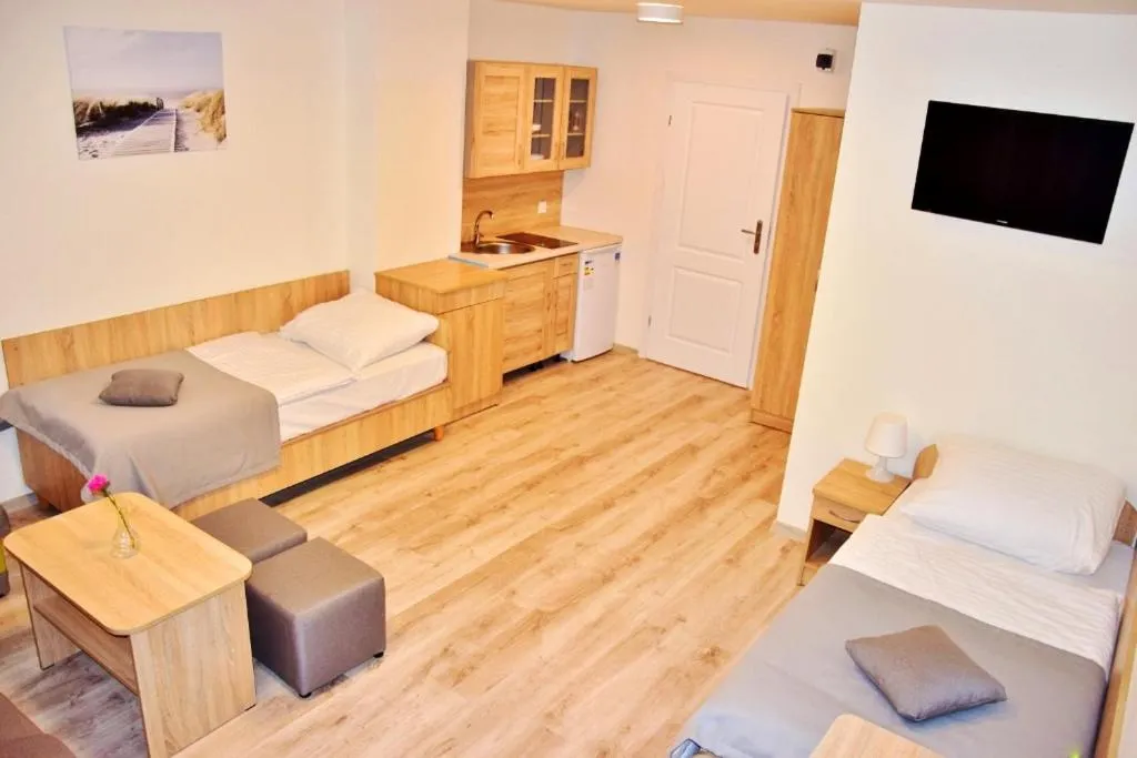 Kitchen or kitchenette, Bed in Dom Gościnny Matex