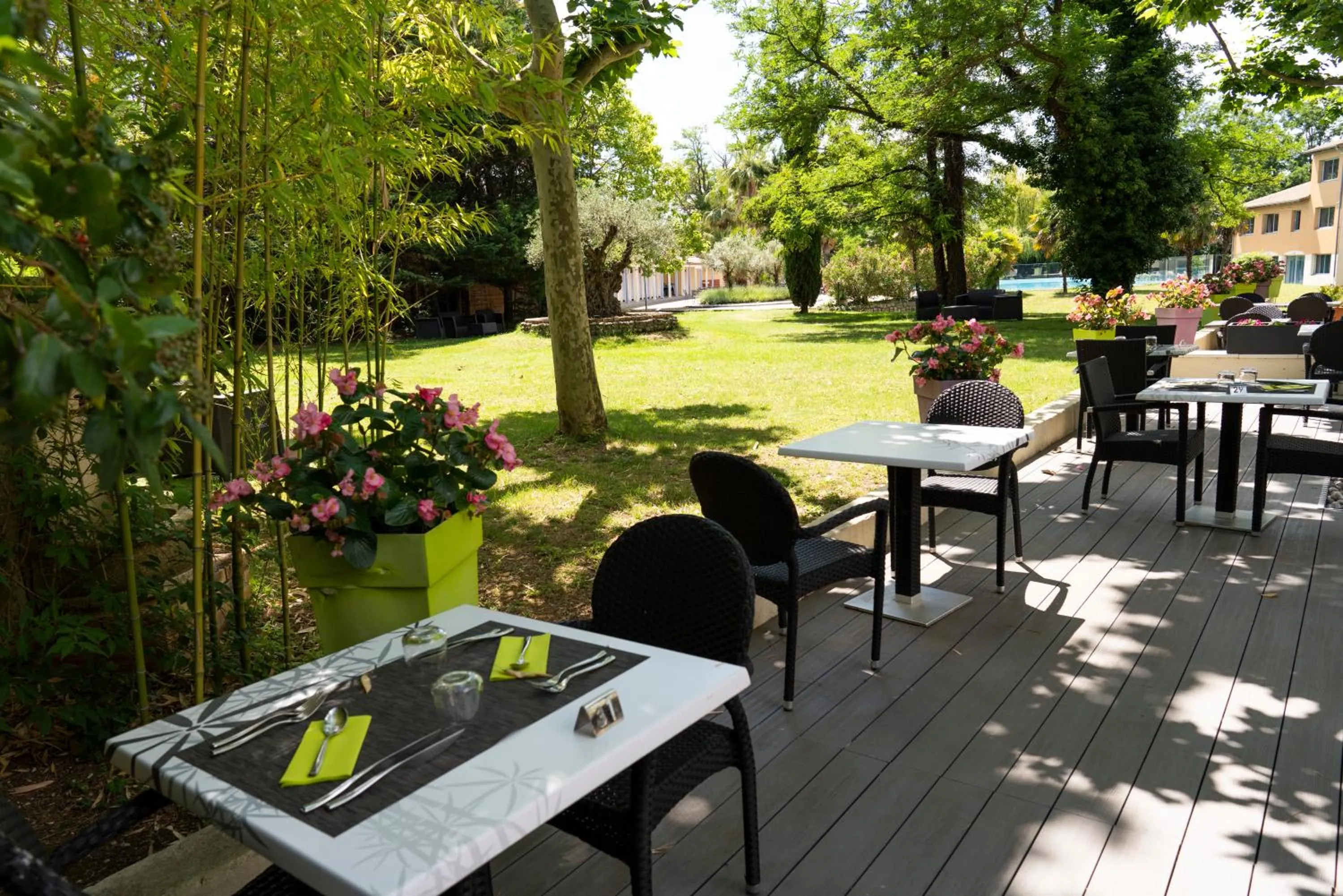 Patio in Logis Hotel Restaurant SPA Les Oliviers