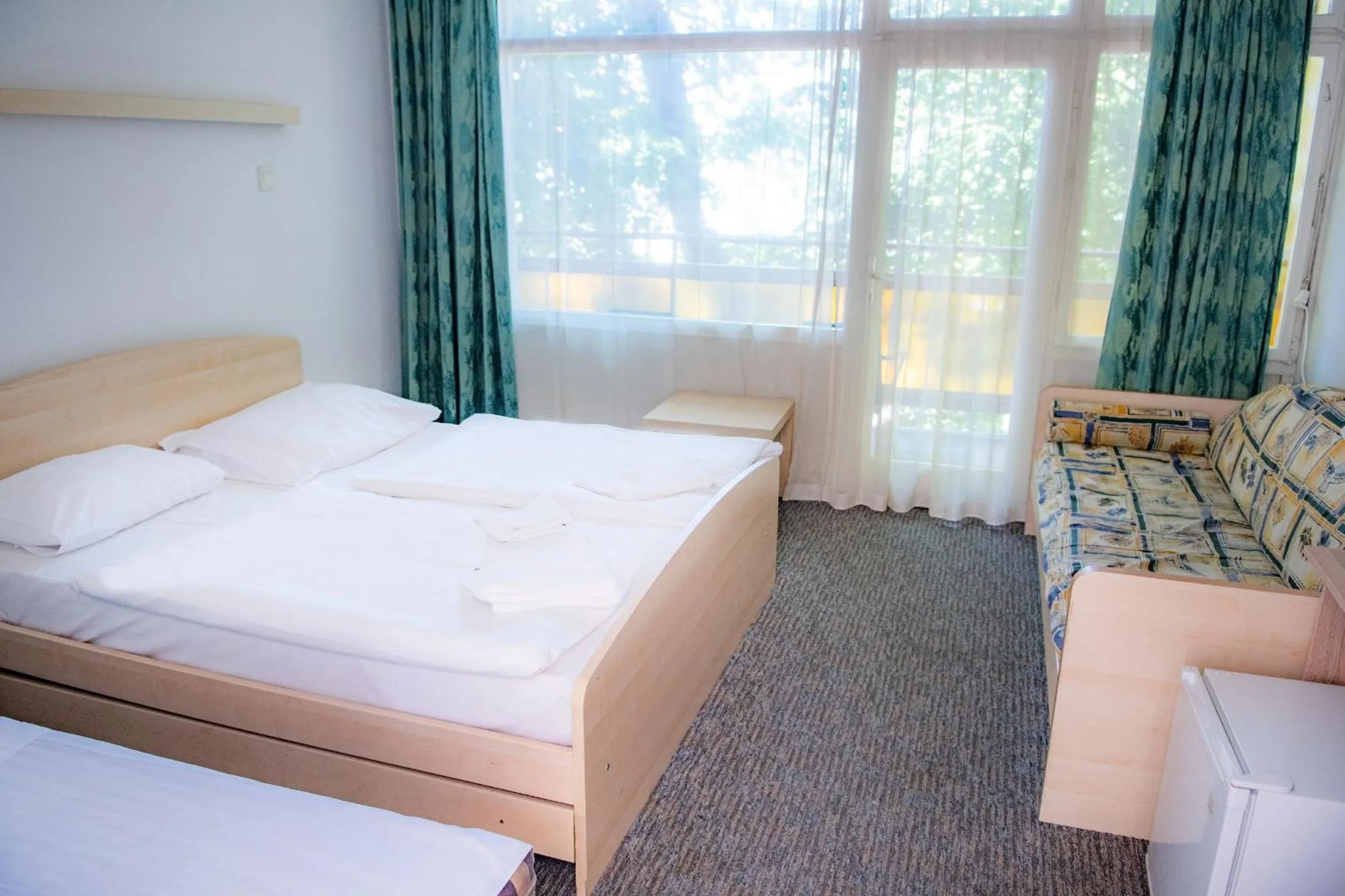 Photo of the whole room in CE Napfény Hotel