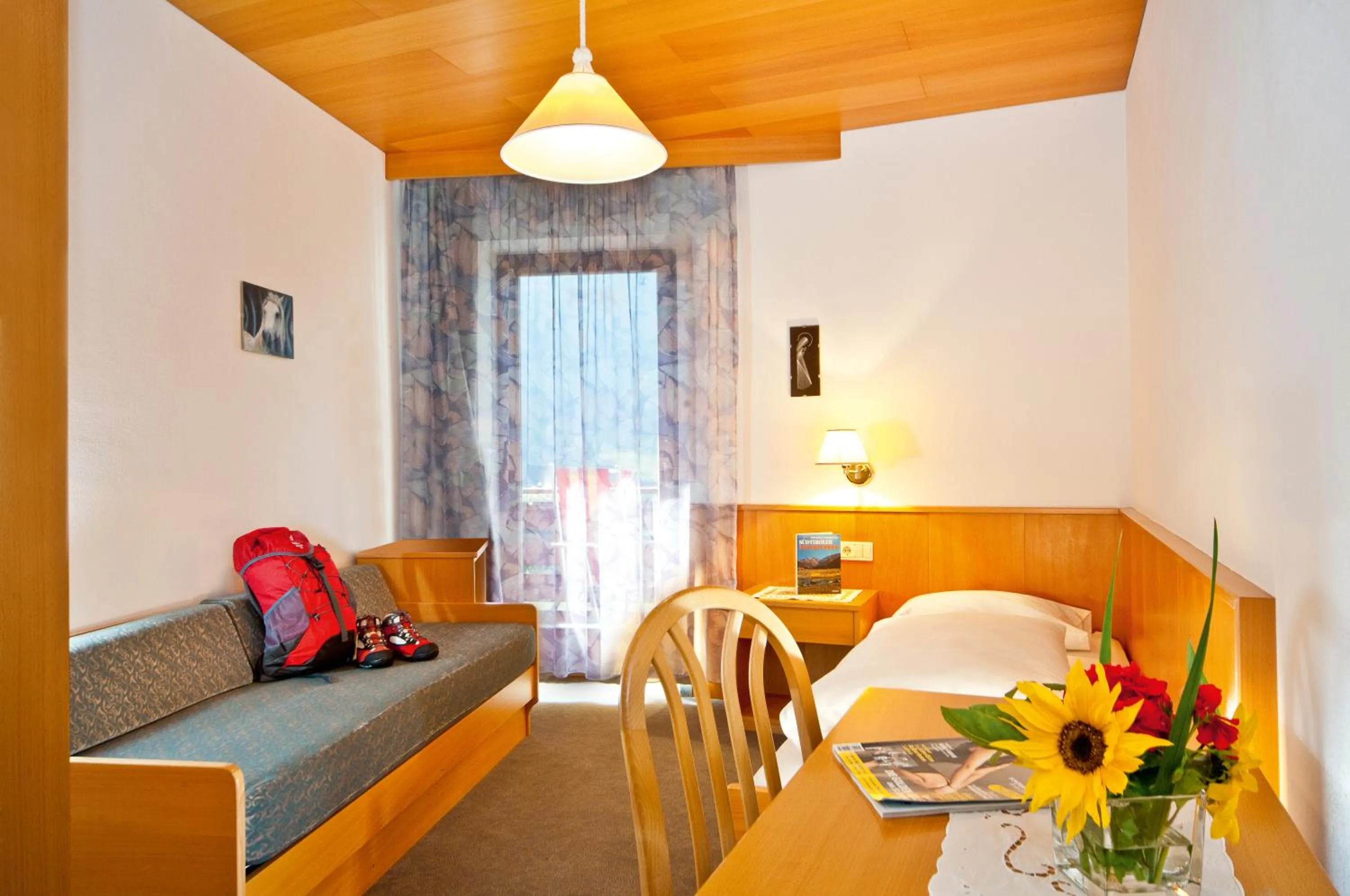 Bed in Alpinhotel Vajolet - Adults only