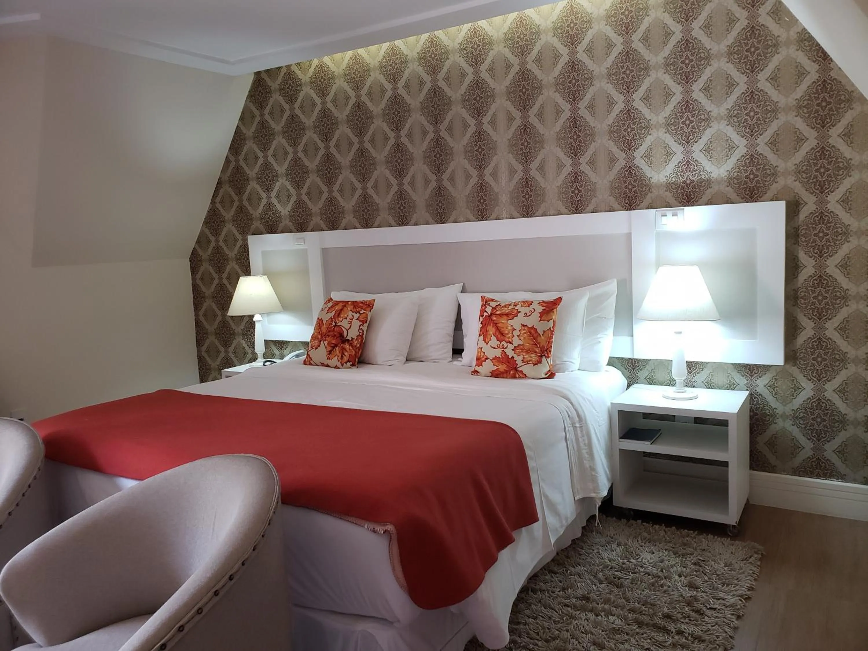 Bed in Pousada Annecy - CAPIVARI Fácil acesso ao centrinho e Baden Bar