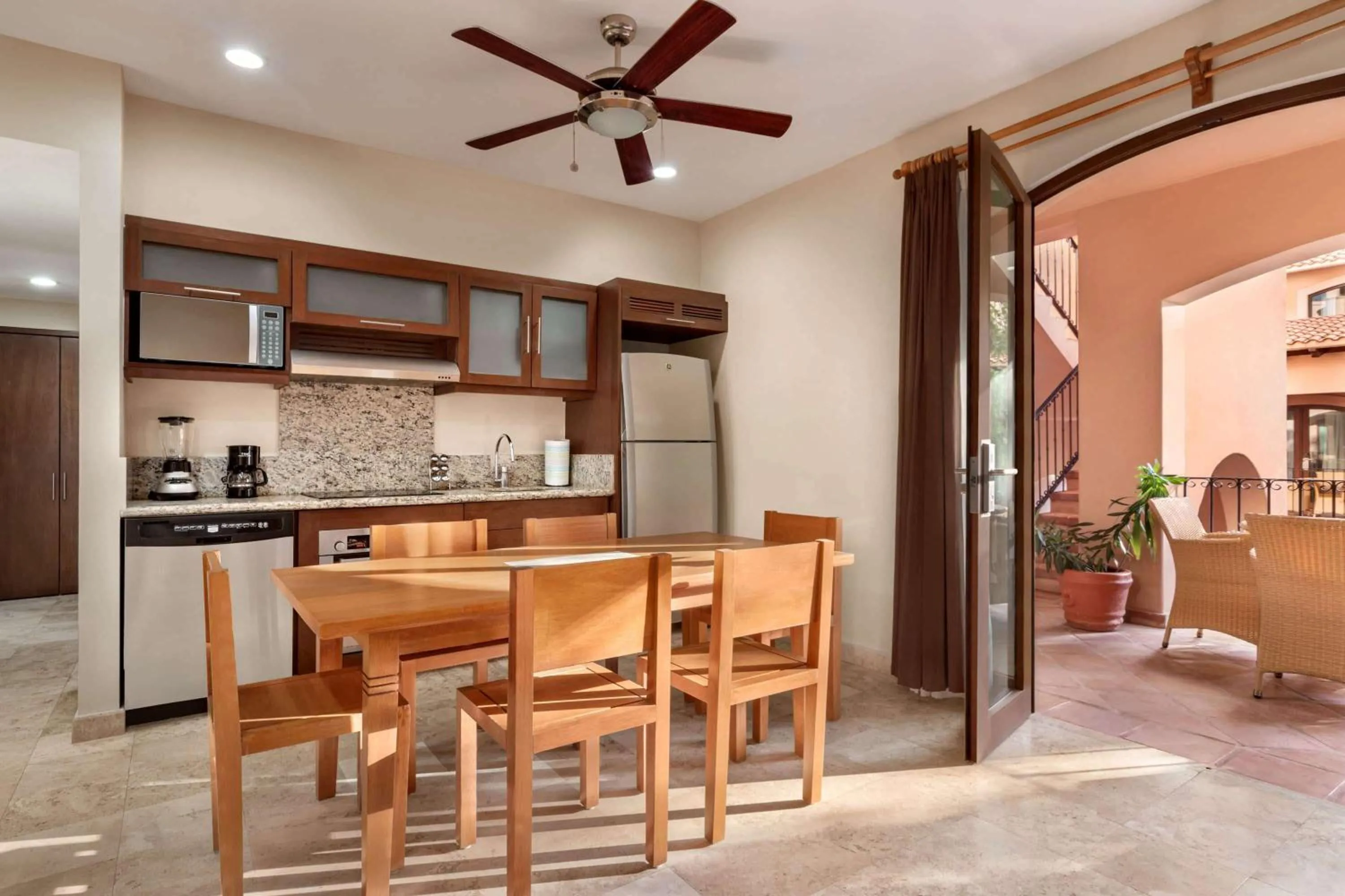 Kitchen or kitchenette in Acanto Hotel Playa del Carmen, Trademark Collection by Wyndham