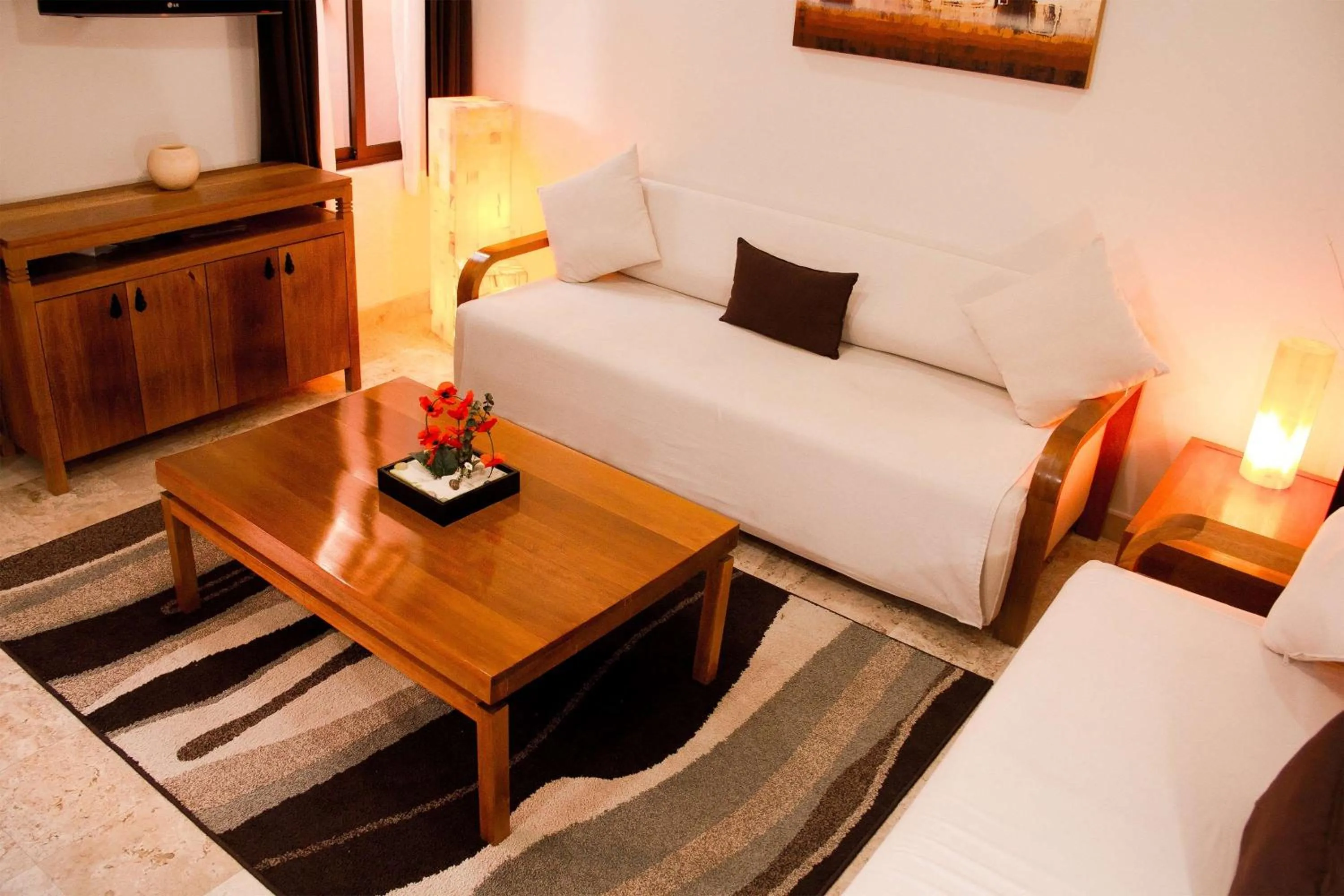 Living room in Acanto Hotel Playa del Carmen, Trademark Collection by Wyndham