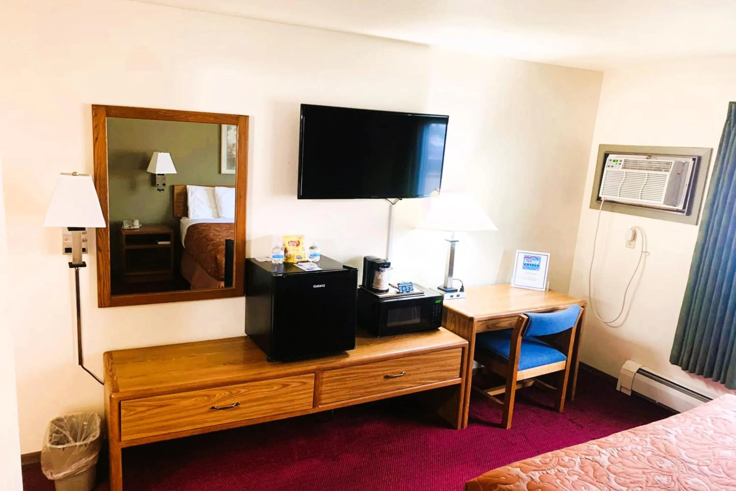 Bedroom, Bed in Love Hotels Staples by OYO at HWY 10 MN