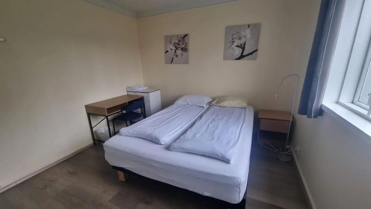 Bed in Igdlo Guesthouse