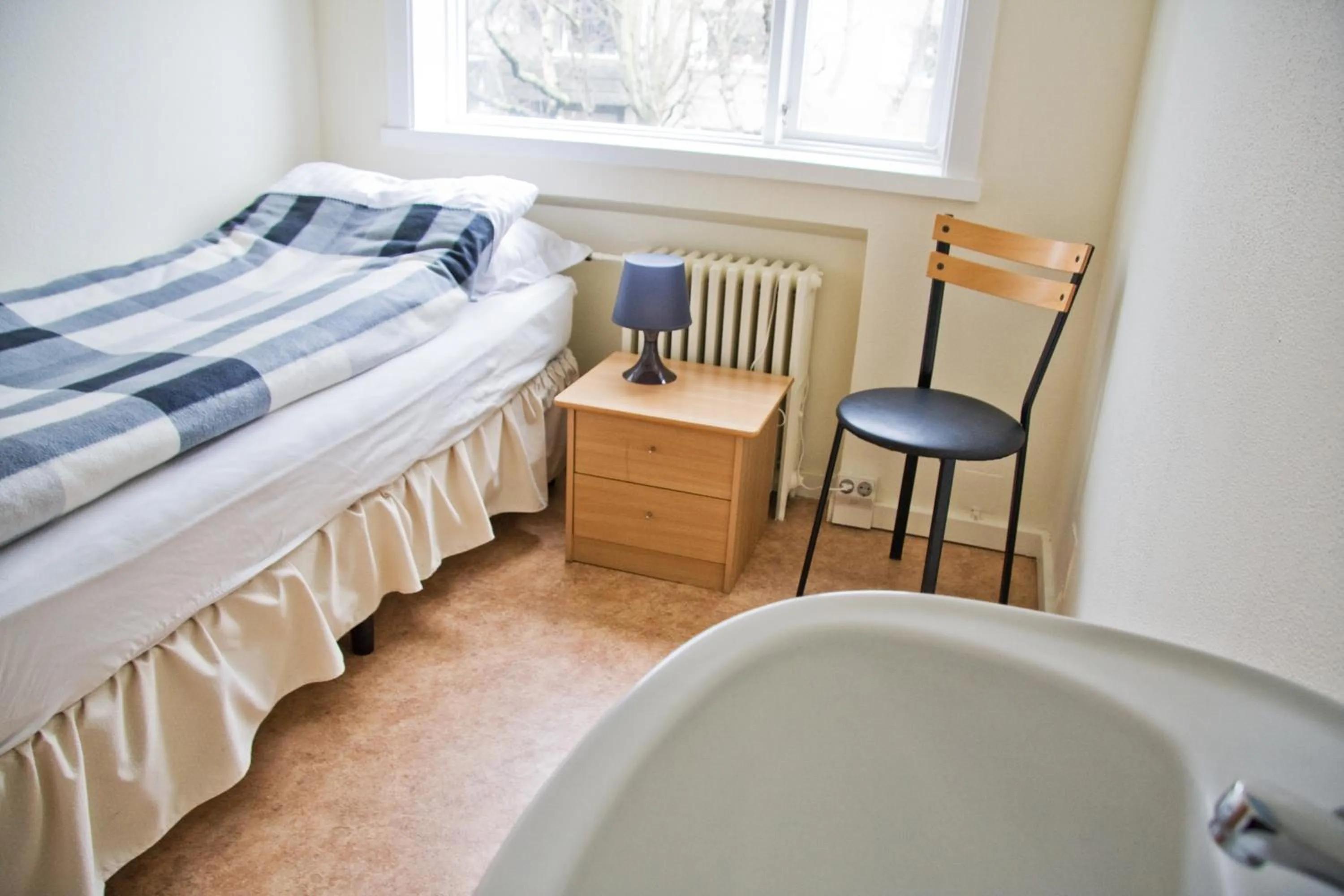 Bed in Igdlo Guesthouse