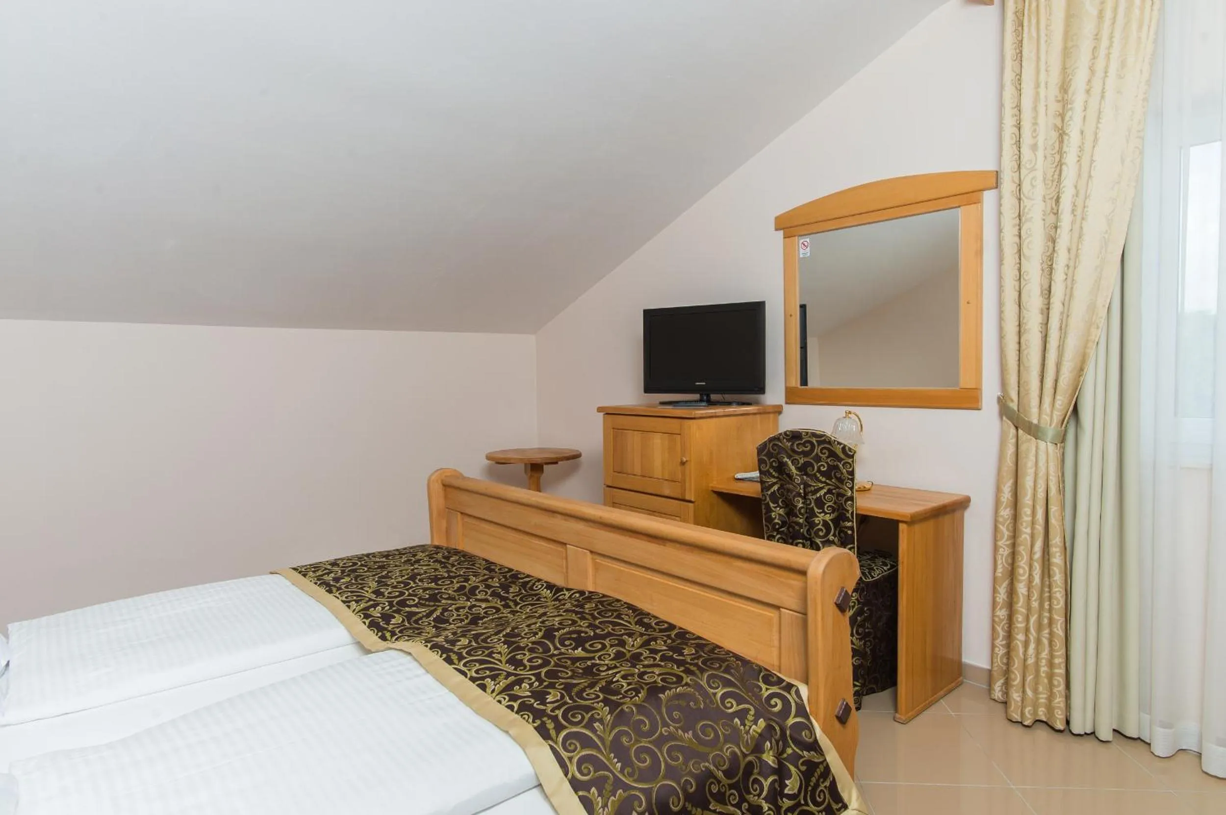 Bed in Hotel Miramare