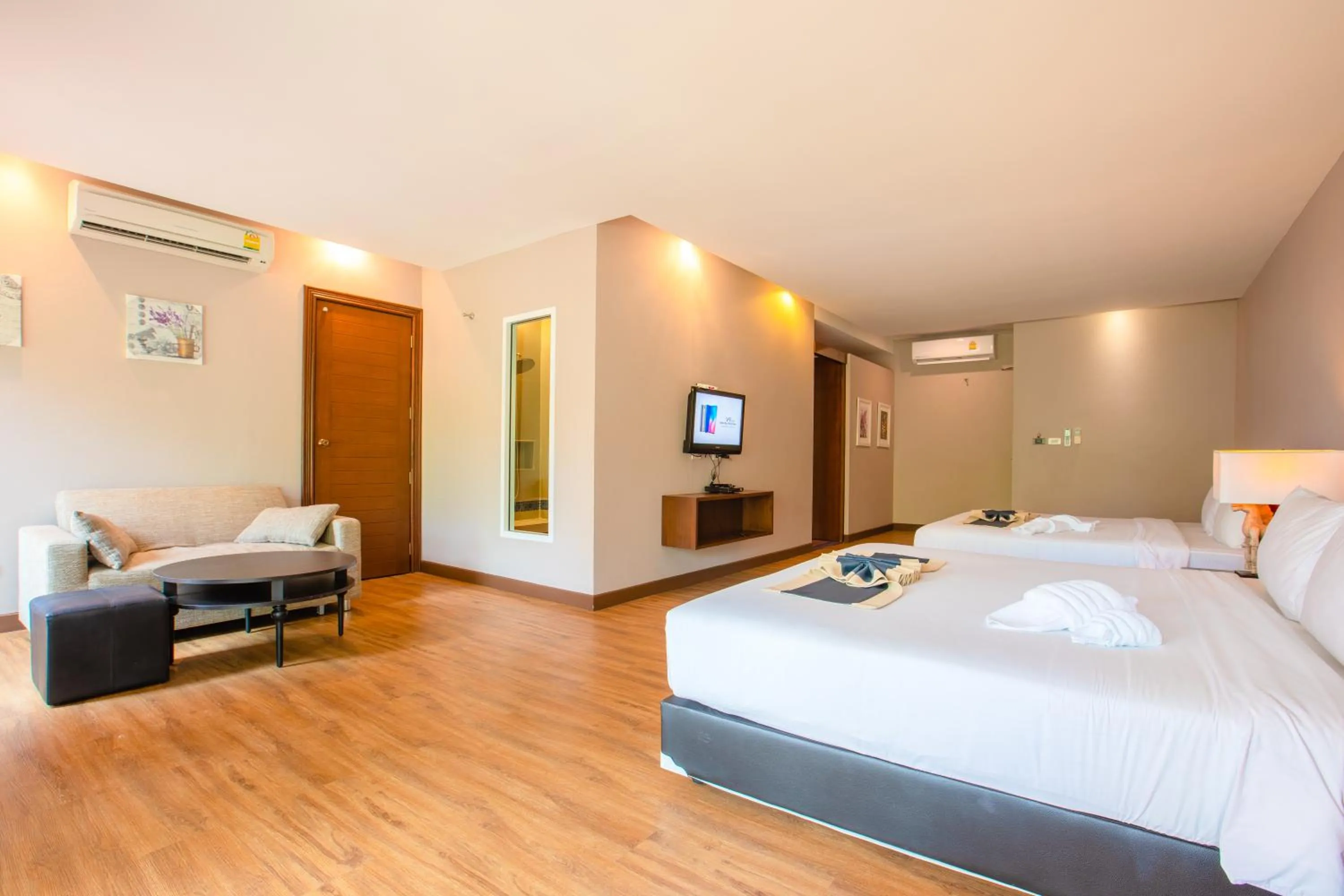 Bed in C&N Kho Khao Beach Resort - SHA Plus