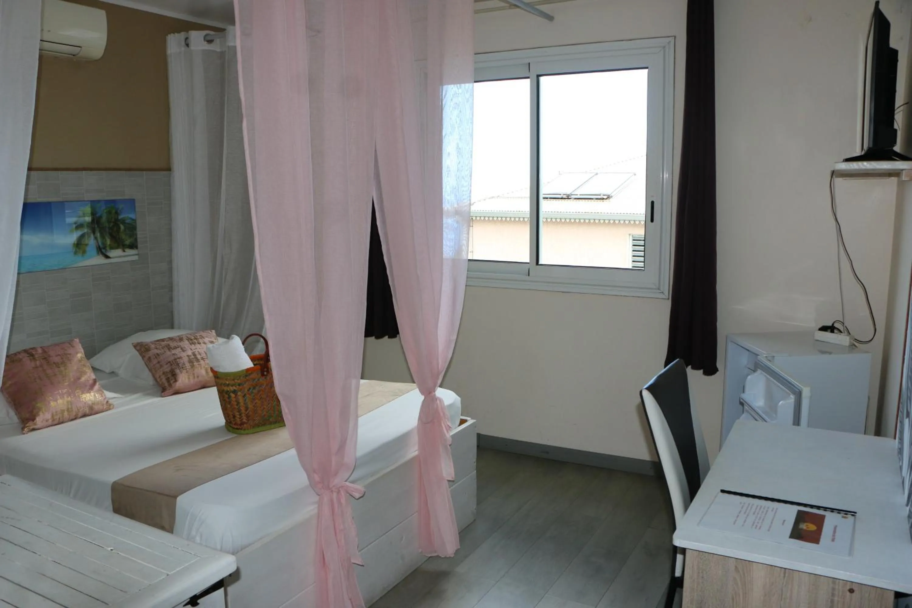 Bed in Hôtel Le Soleil Couchant