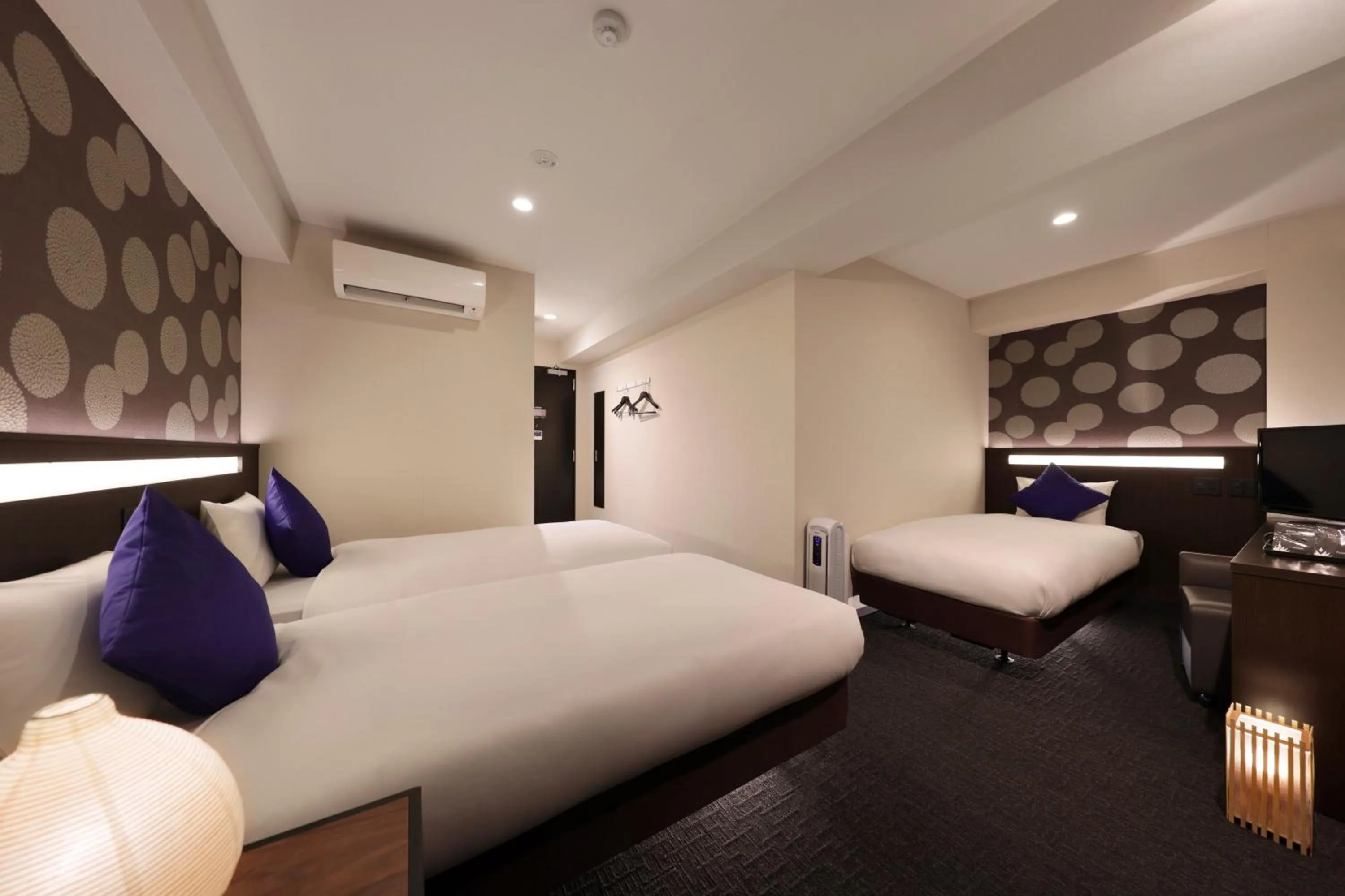 Bed in Marutamachi Crystal Hotel