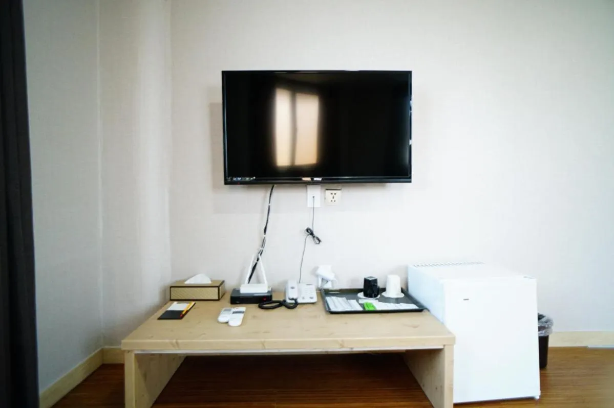 TV and multimedia, TV/Entertainment Center in Ora Stay Hotel