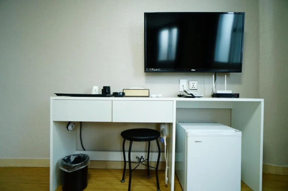 TV and multimedia, TV/Entertainment Center in Ora Stay Hotel