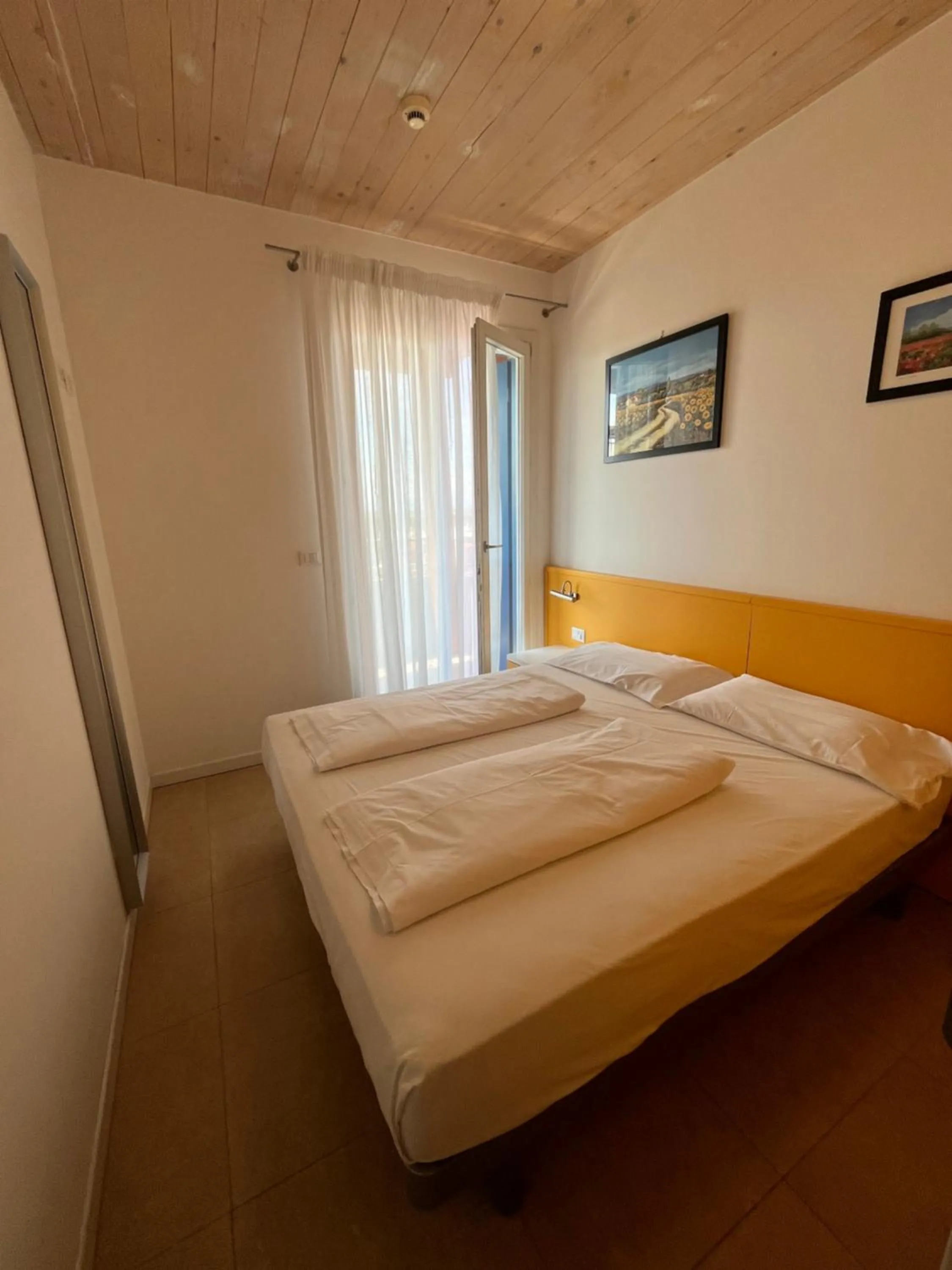 Bed in Villaggio Hemingway - Family Aparthotel