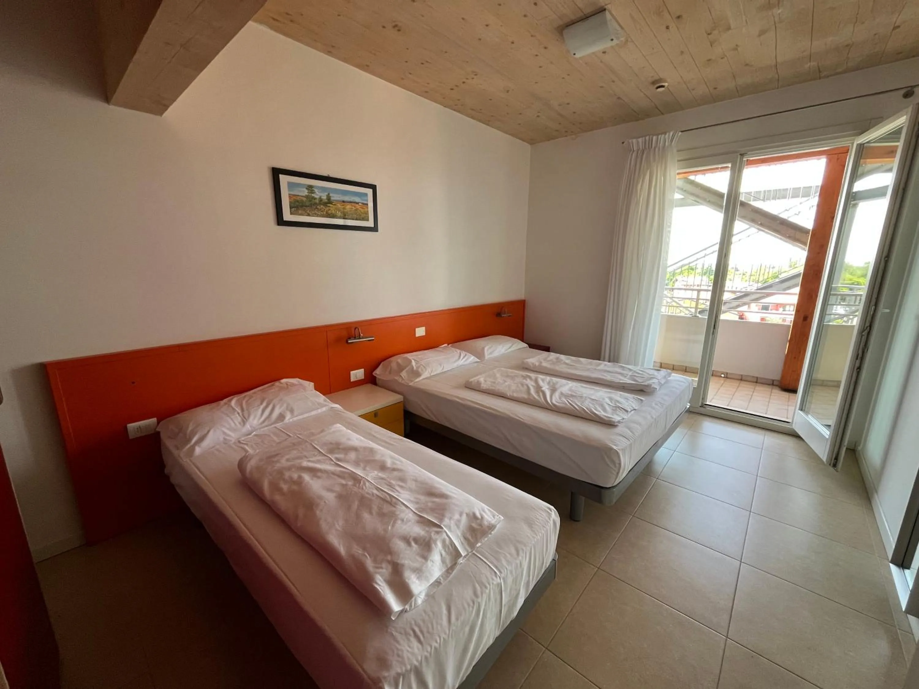 Bed in Villaggio Hemingway - Family Aparthotel