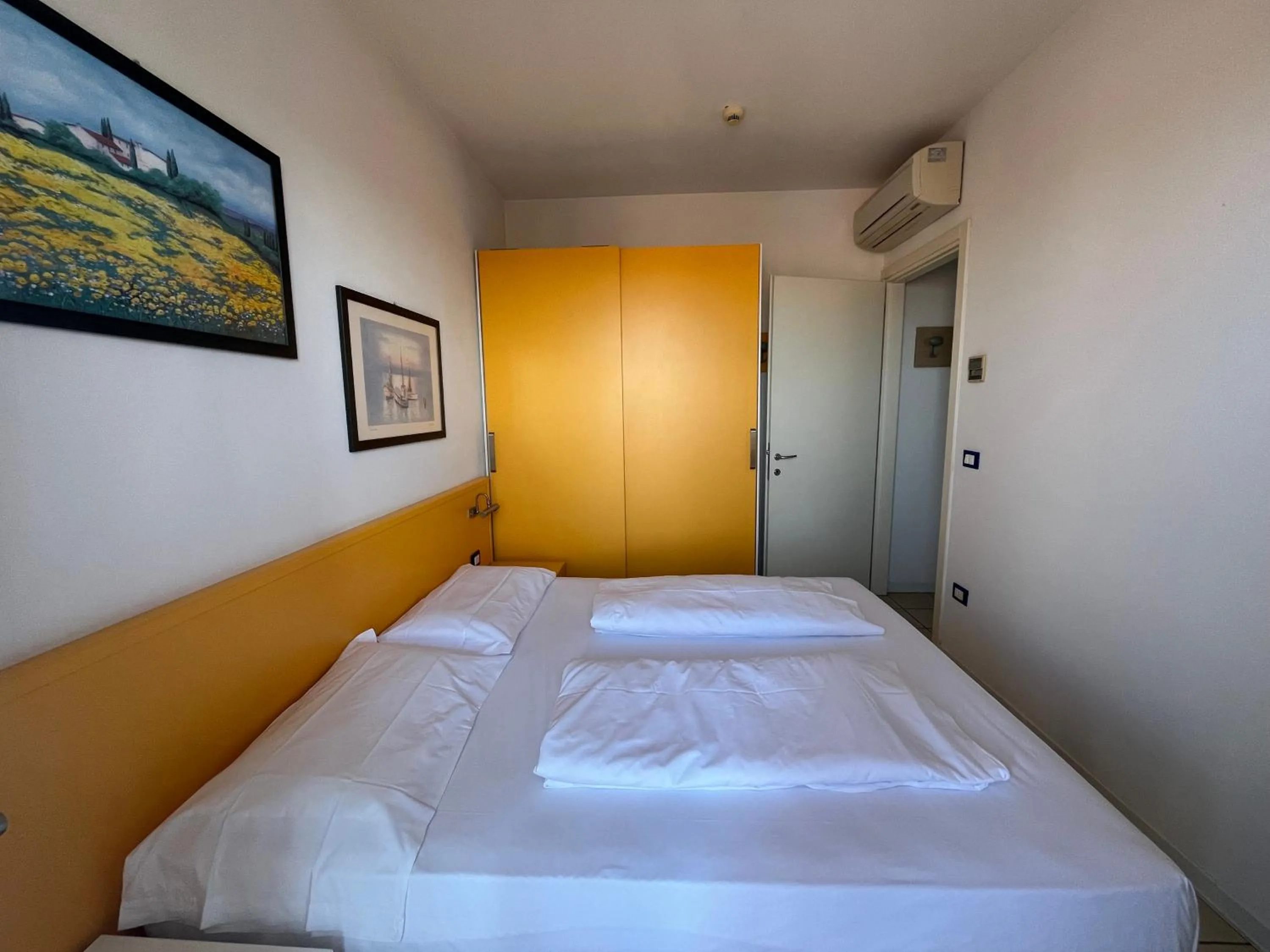 Bed in Villaggio Hemingway - Family Aparthotel