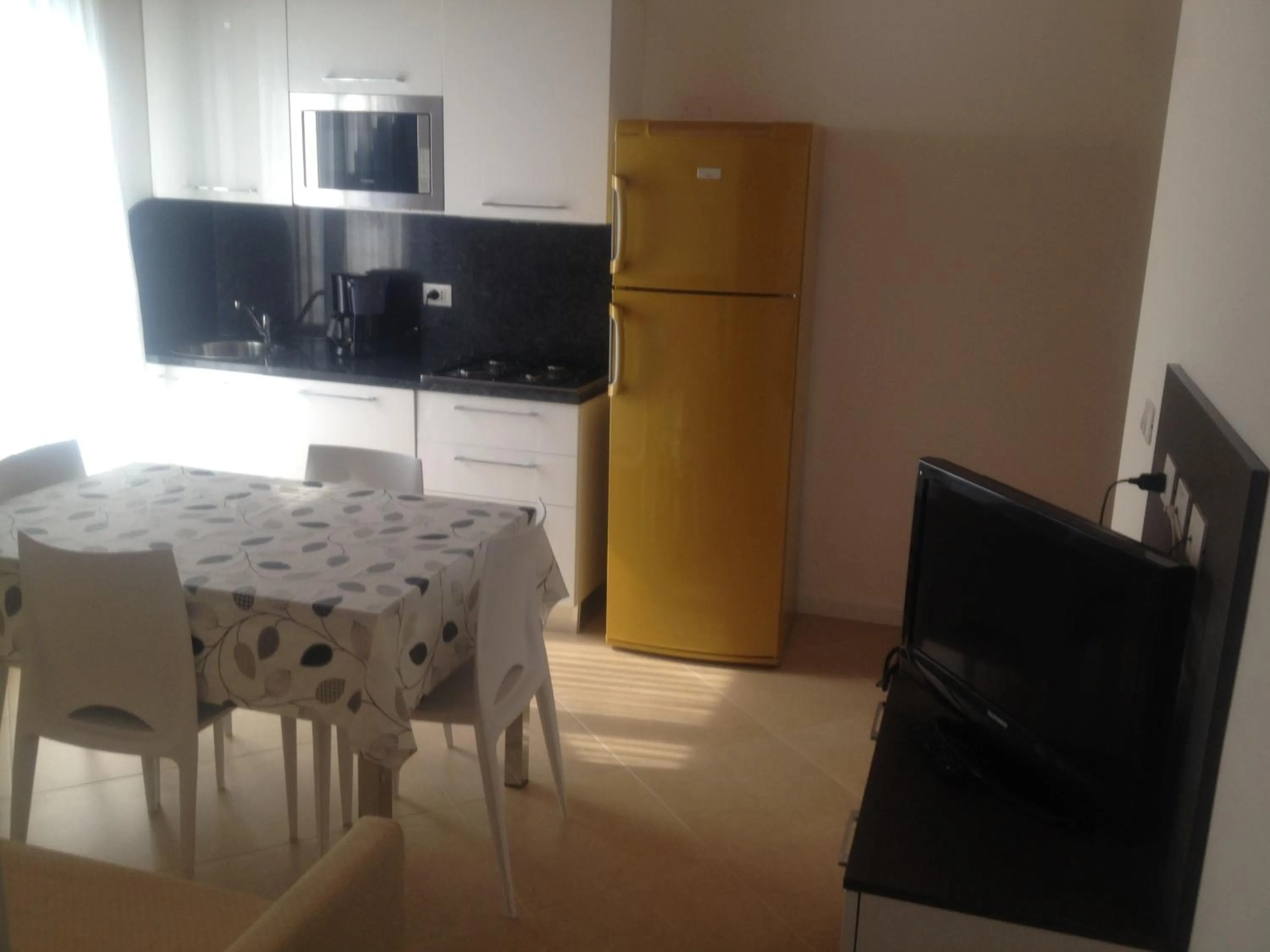 Kitchen or kitchenette in Villaggio Hemingway - Family Aparthotel