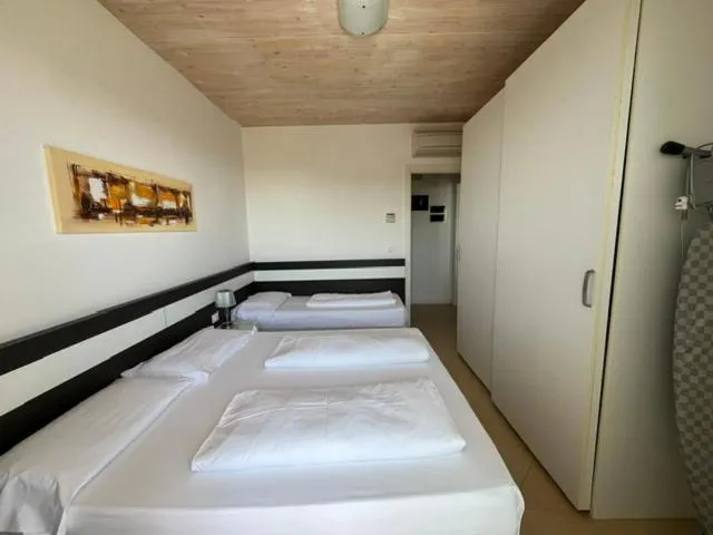 Bed in Villaggio Hemingway - Family Aparthotel