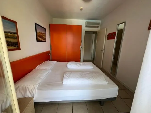 Bed in Villaggio Hemingway - Family Aparthotel